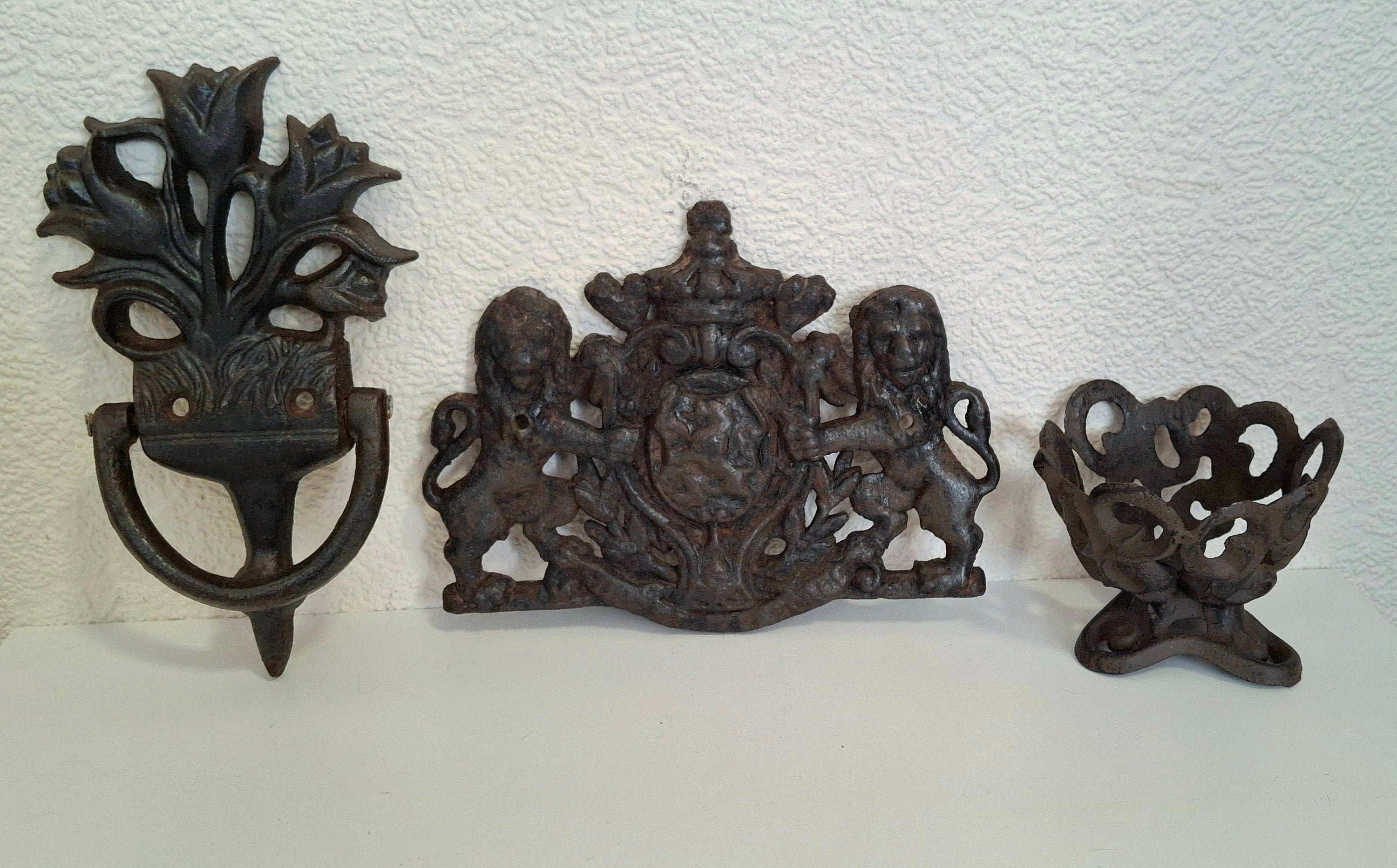 Cast iron door knocker tulip, metal candle holder, antique lions plaque featuring