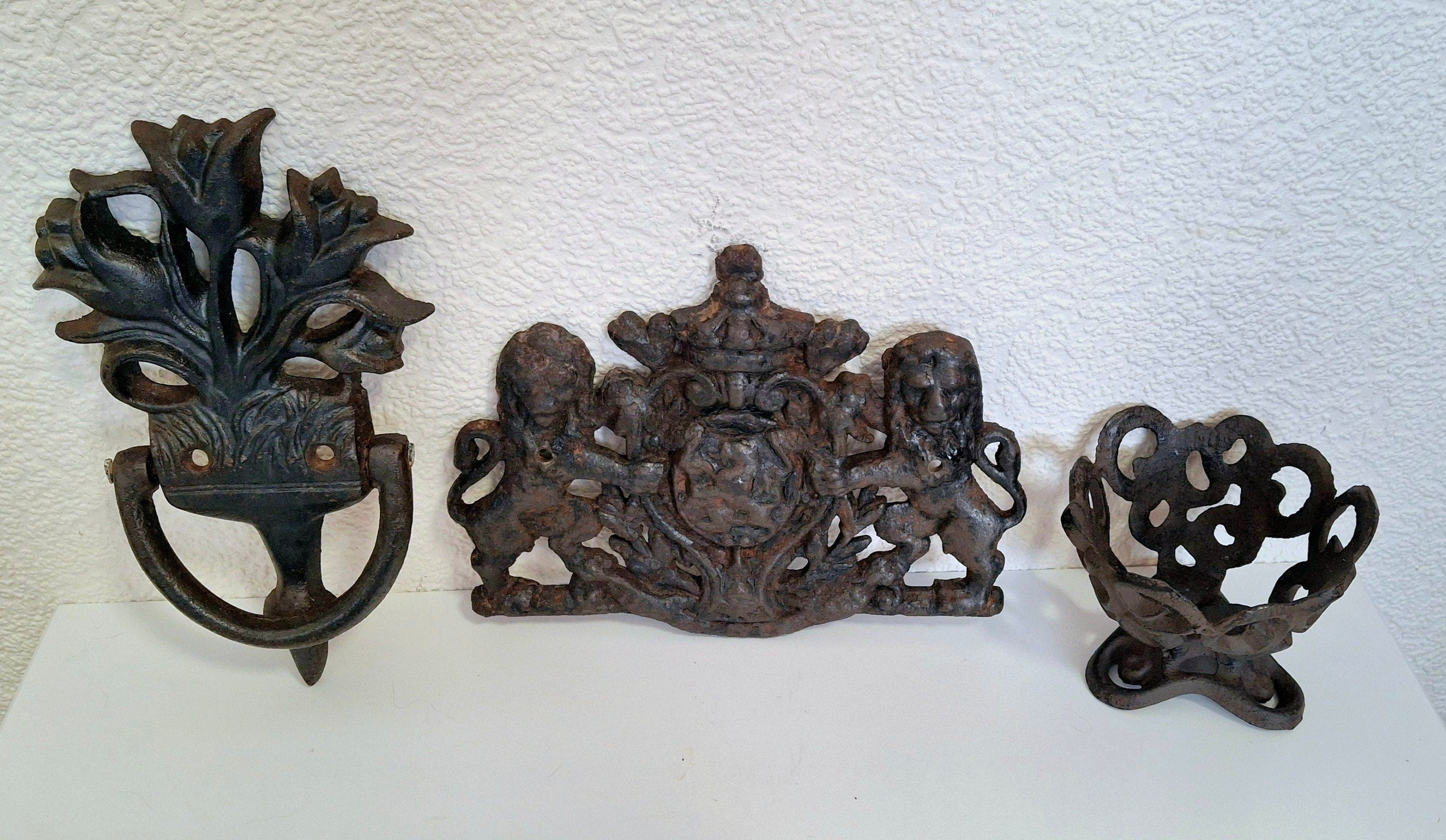 Cast iron door knocker tulip, metal candle holder, antique lions plaque featuring