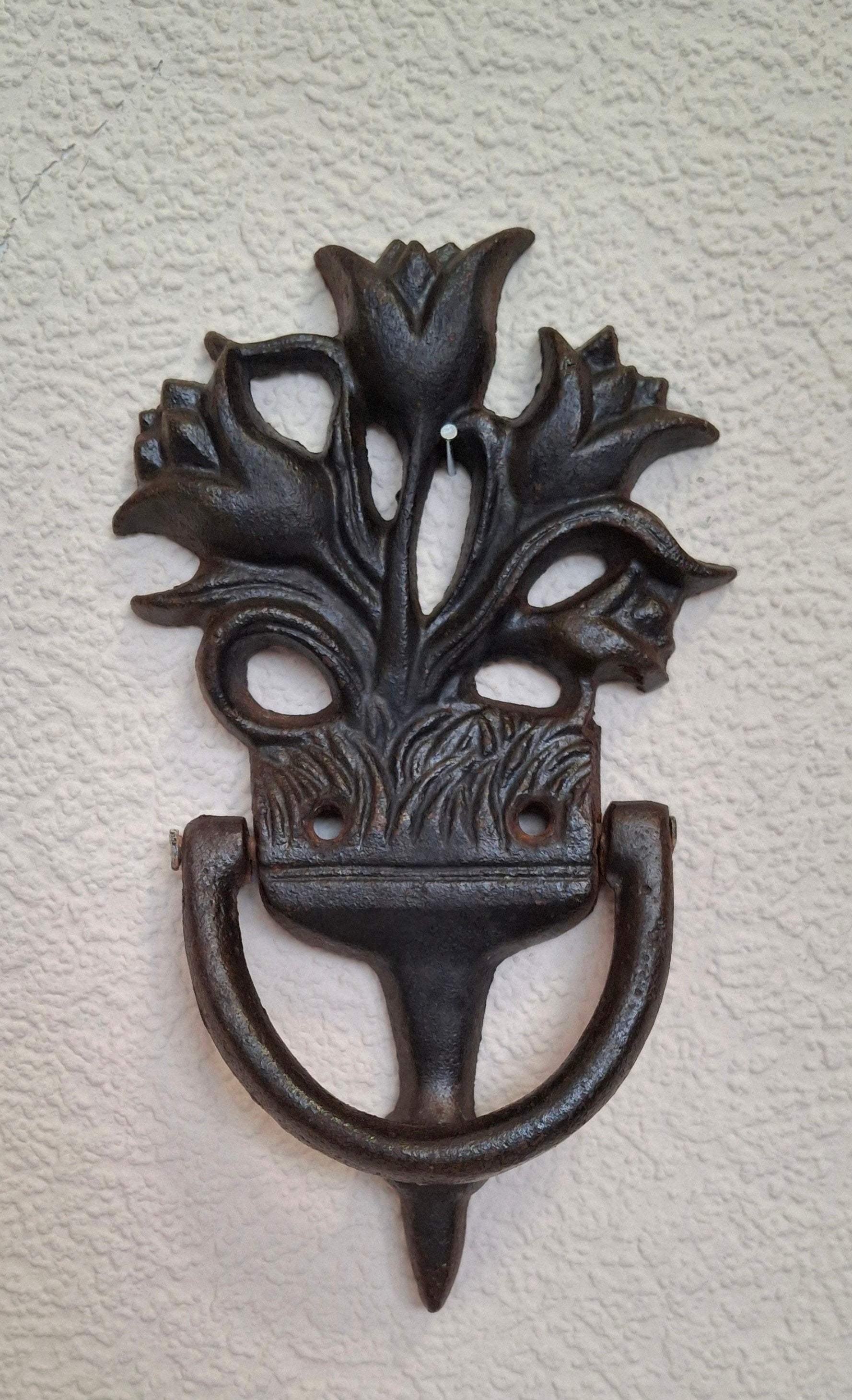 Cast iron door knocker tulip, metal candle holder, antique lions plaque featuring