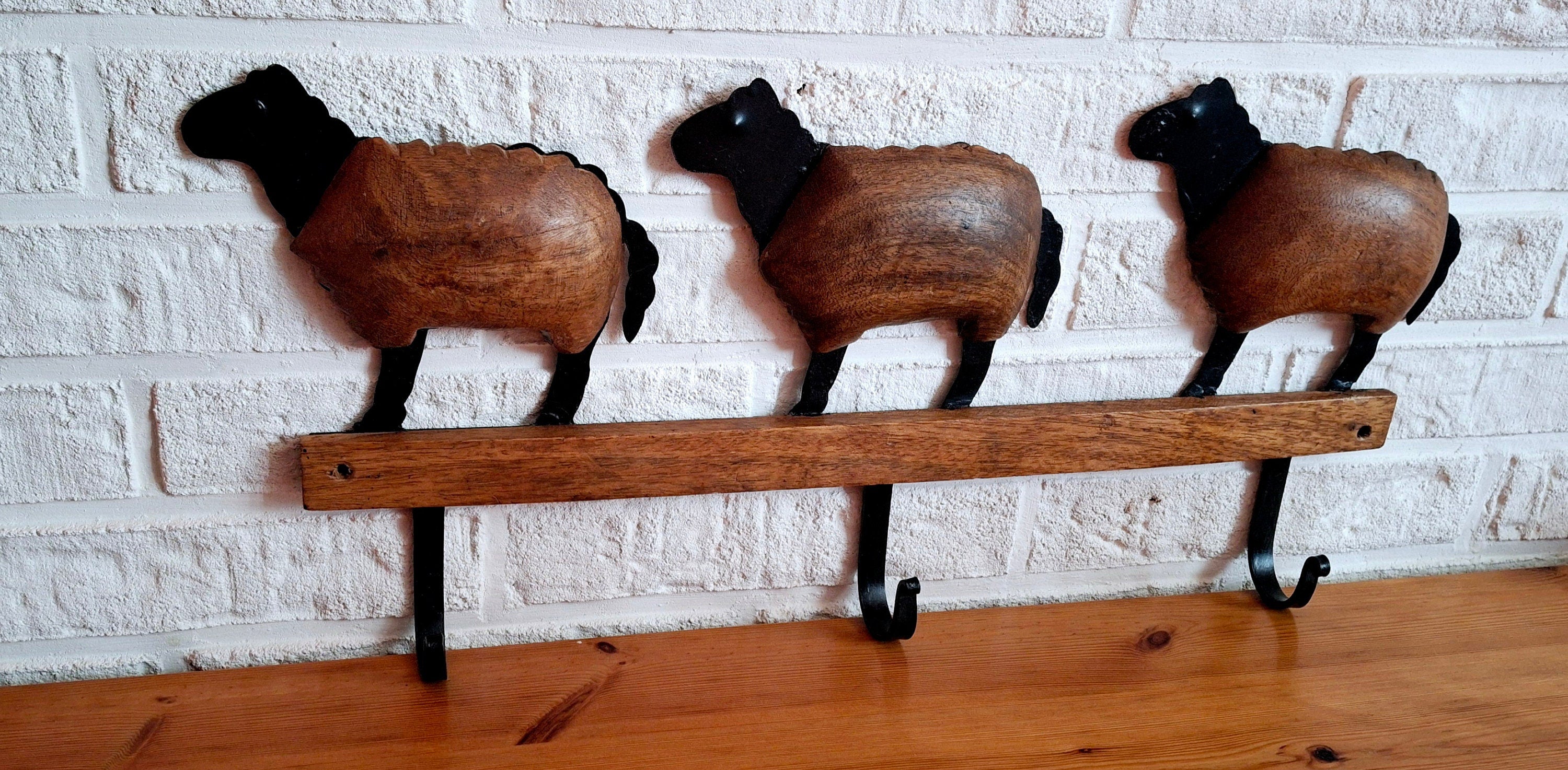 Wooden shaped sheeps with metal hooks, Vintage wooden and black metal coat hangers
