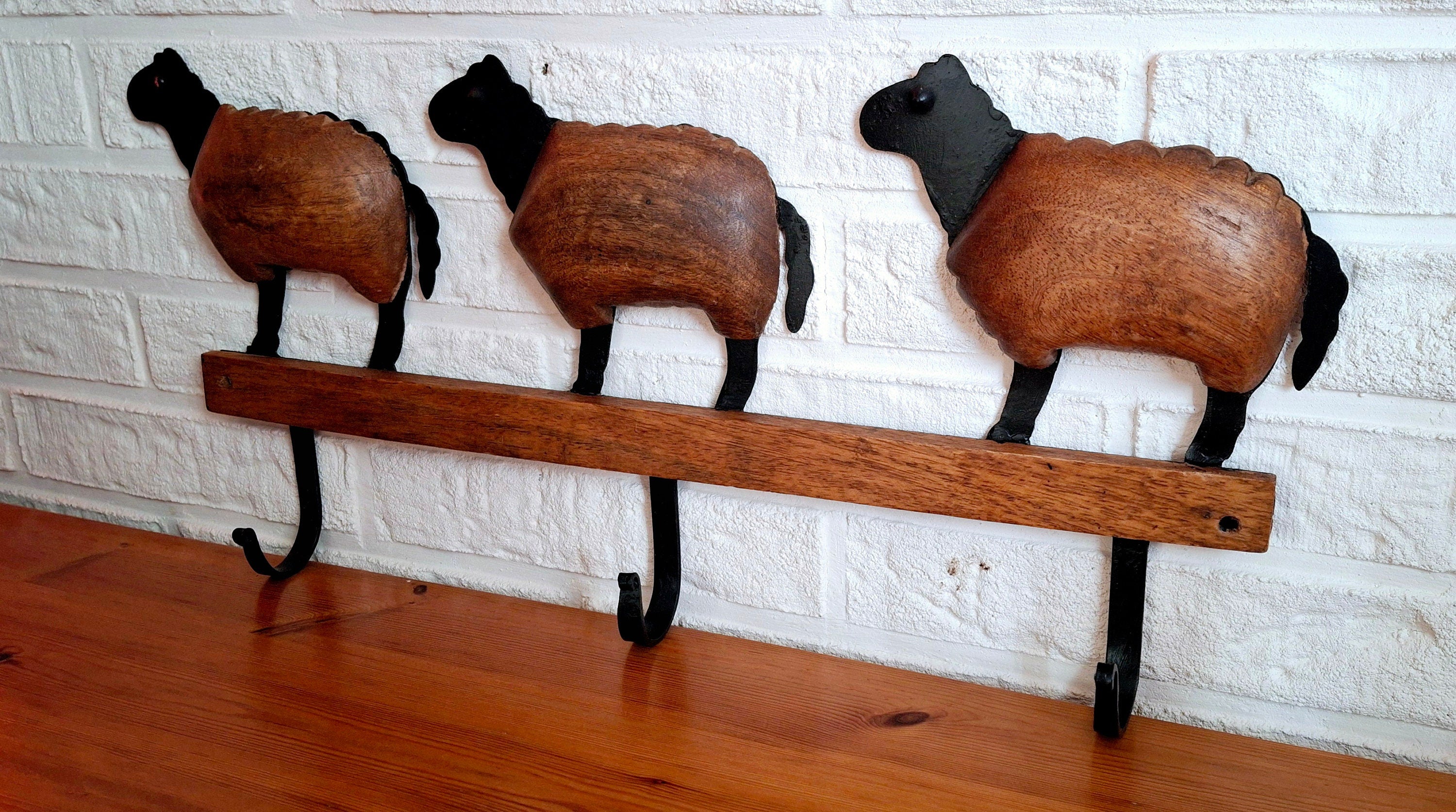 Wooden shaped sheeps with metal hooks, Vintage wooden and black metal coat hangers
