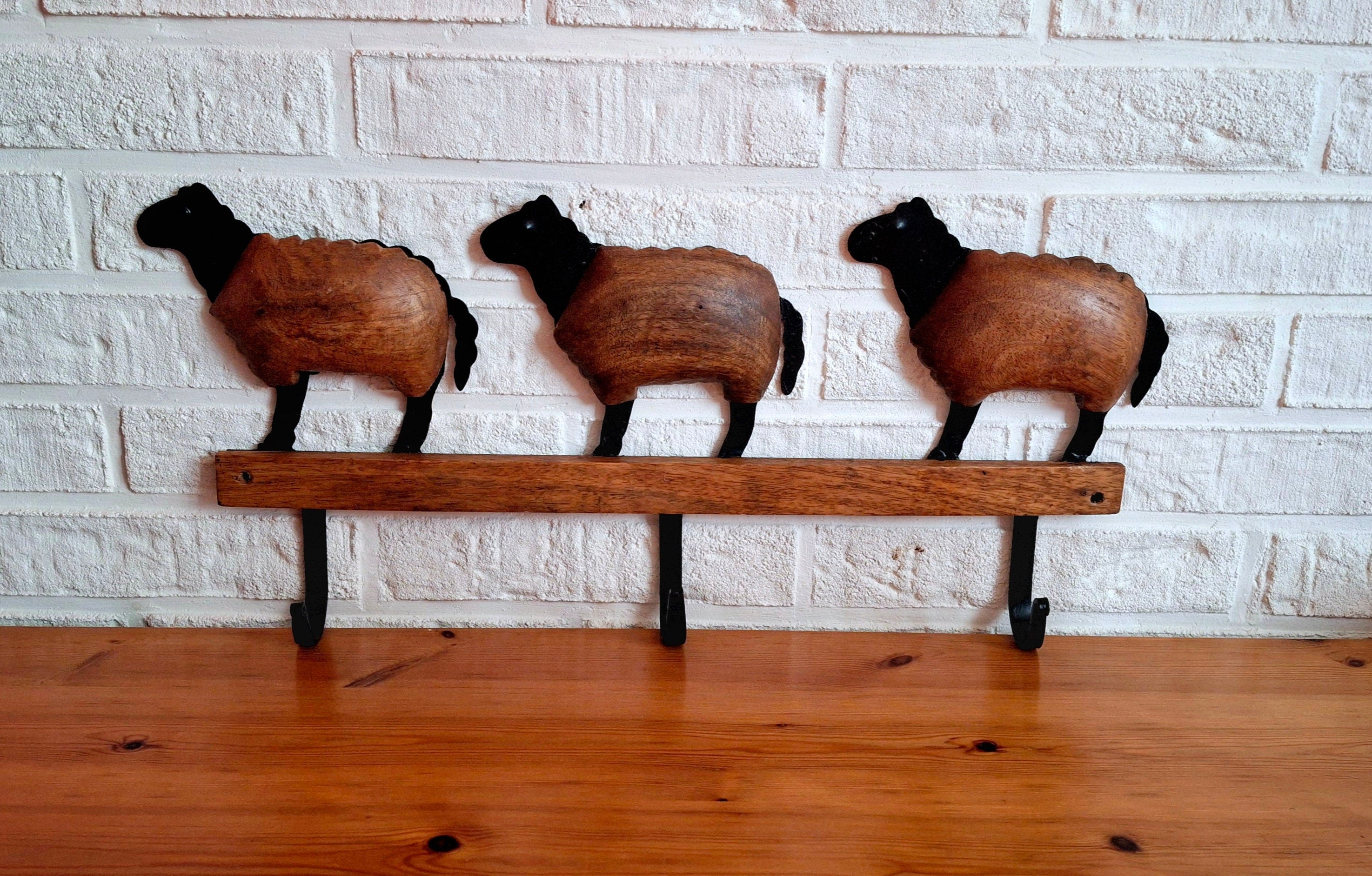 Wooden shaped sheeps with metal hooks, Vintage wooden and black metal coat hangers