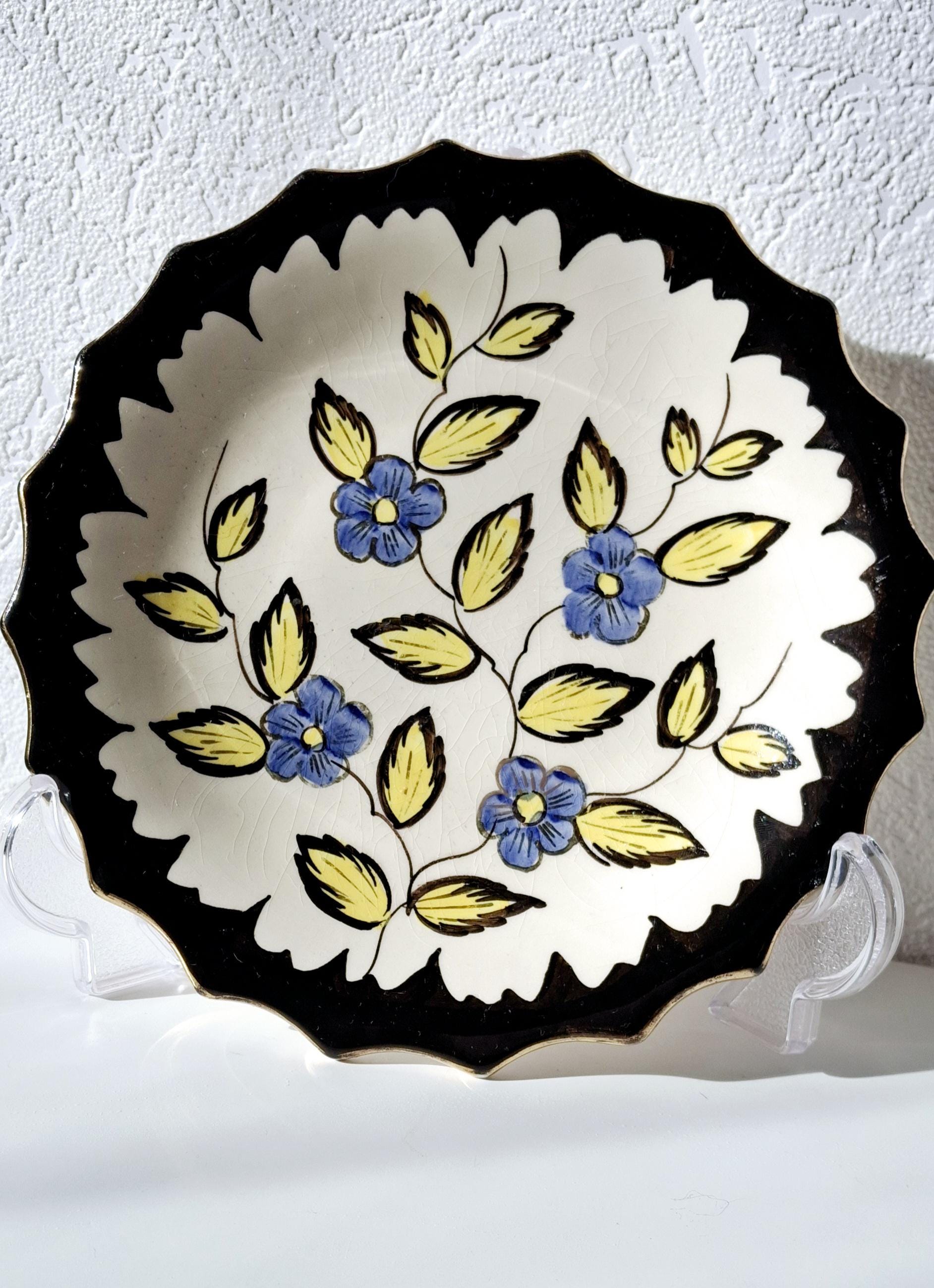 Vintage Diana Gouda decorative plates with gold detailing