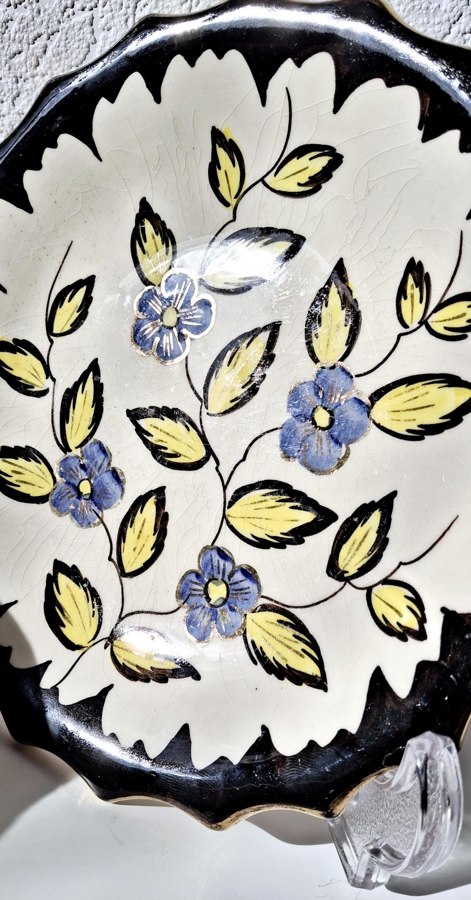 Vintage Diana Gouda decorative plates with gold detailing