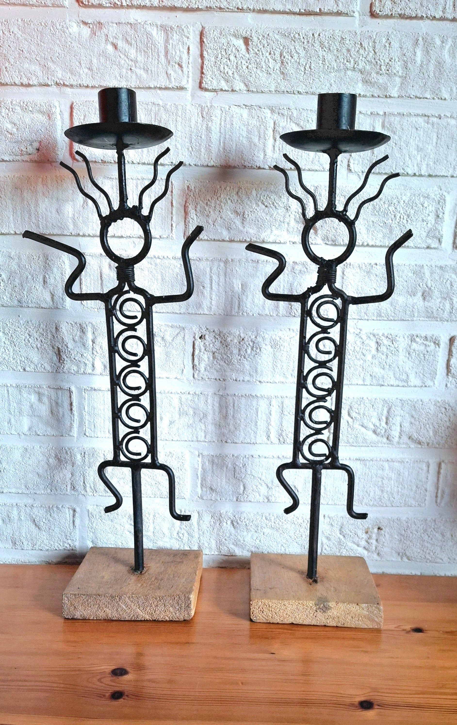 Pair of vintage figurative candlesticks
