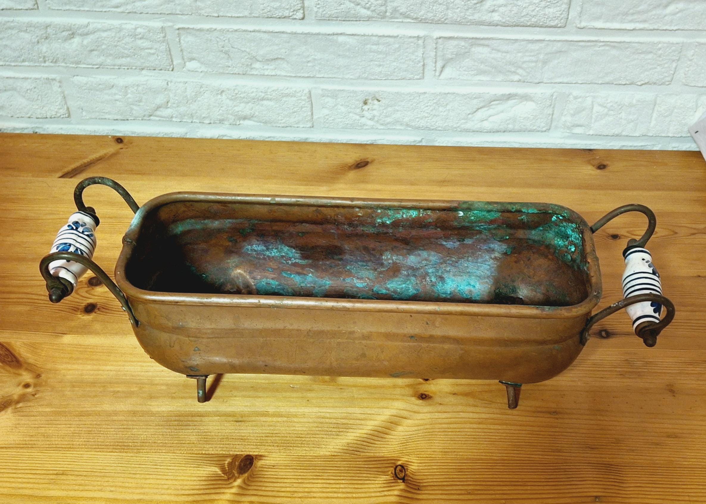 Two antique dutch copper planters, Hand wash bowl with Delft Porcelain Handles