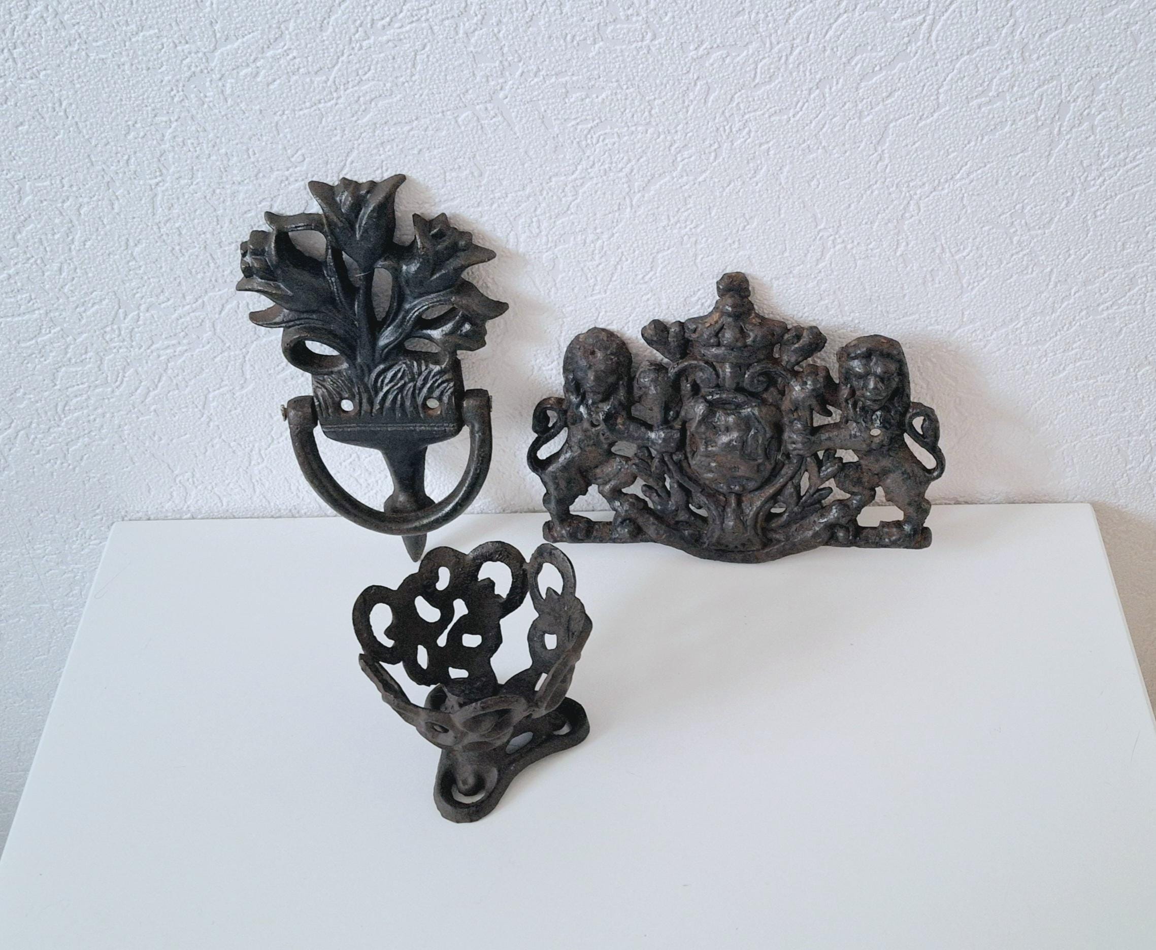 Cast iron door knocker tulip, metal candle holder, antique lions plaque featuring