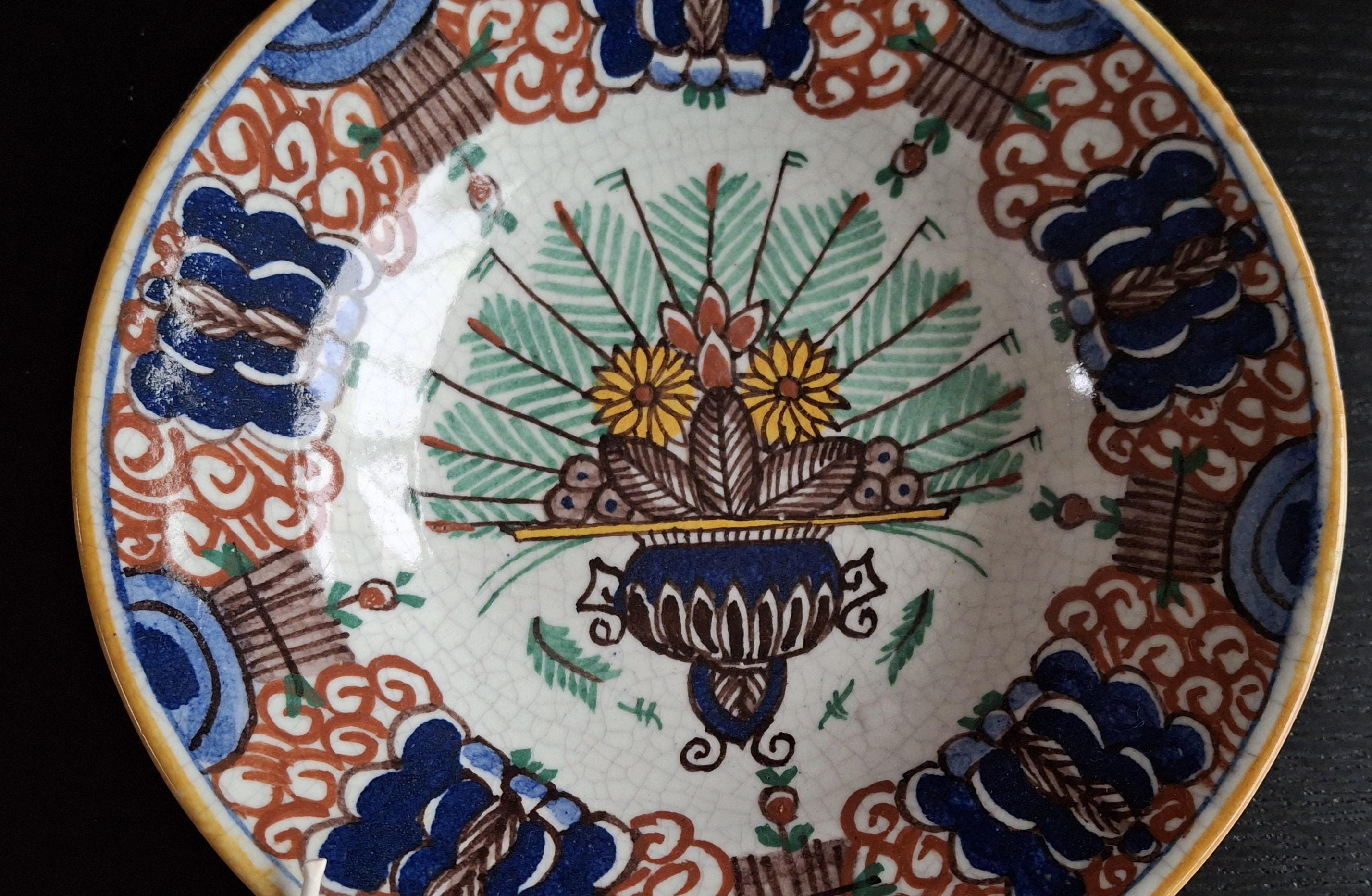Antique peacock wall plates, 19th century Delftware
