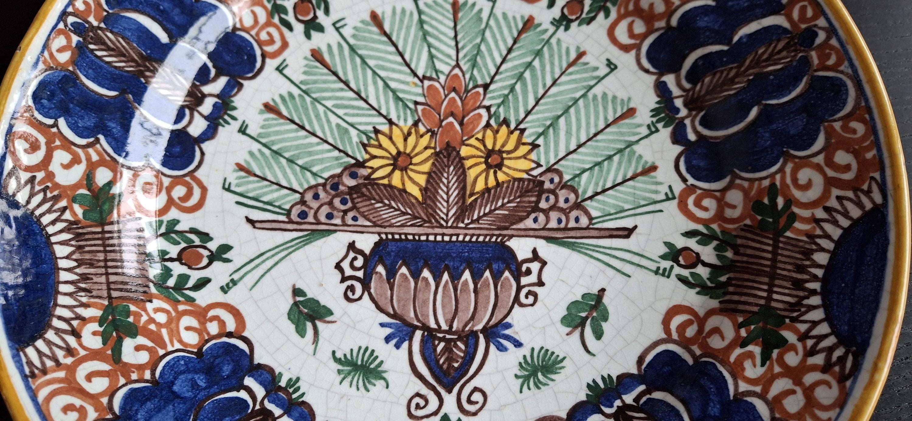 Antique peacock wall plates, 19th century Delftware