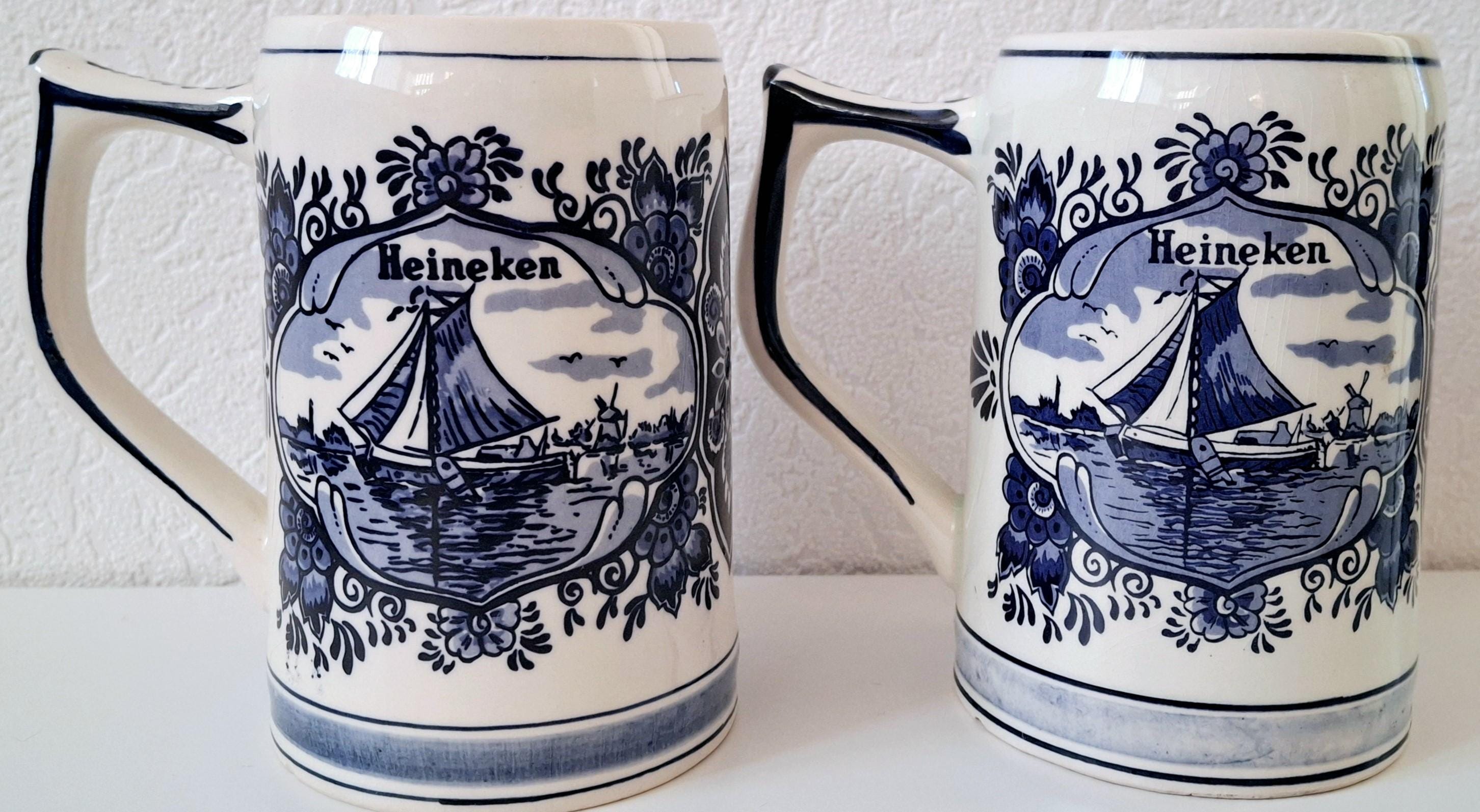 Pair of vintage Heineken Delft Blue beer mugs, Dutch beer steins