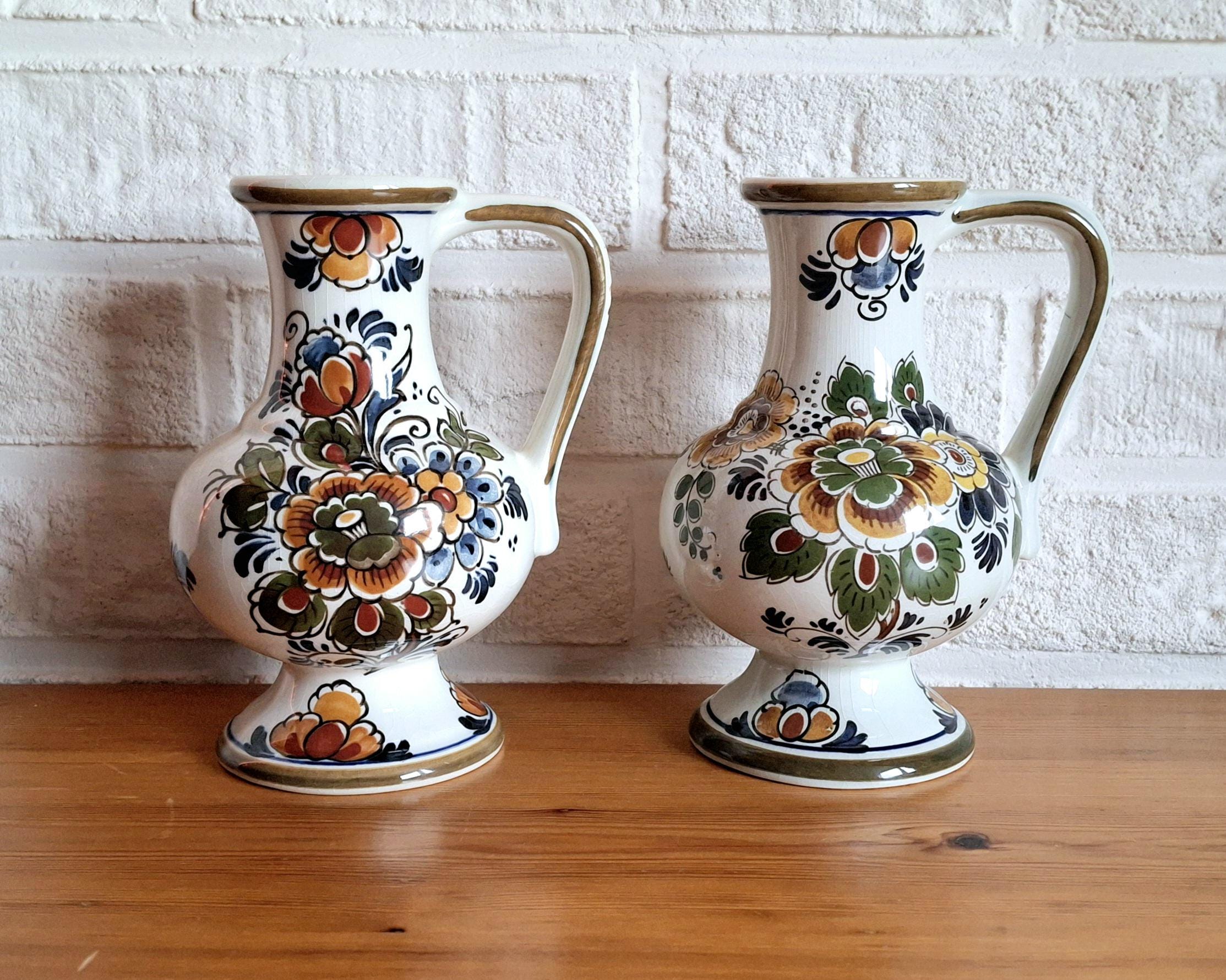 Pair of Delft Polychrome jugs, set of two Delft pitchers