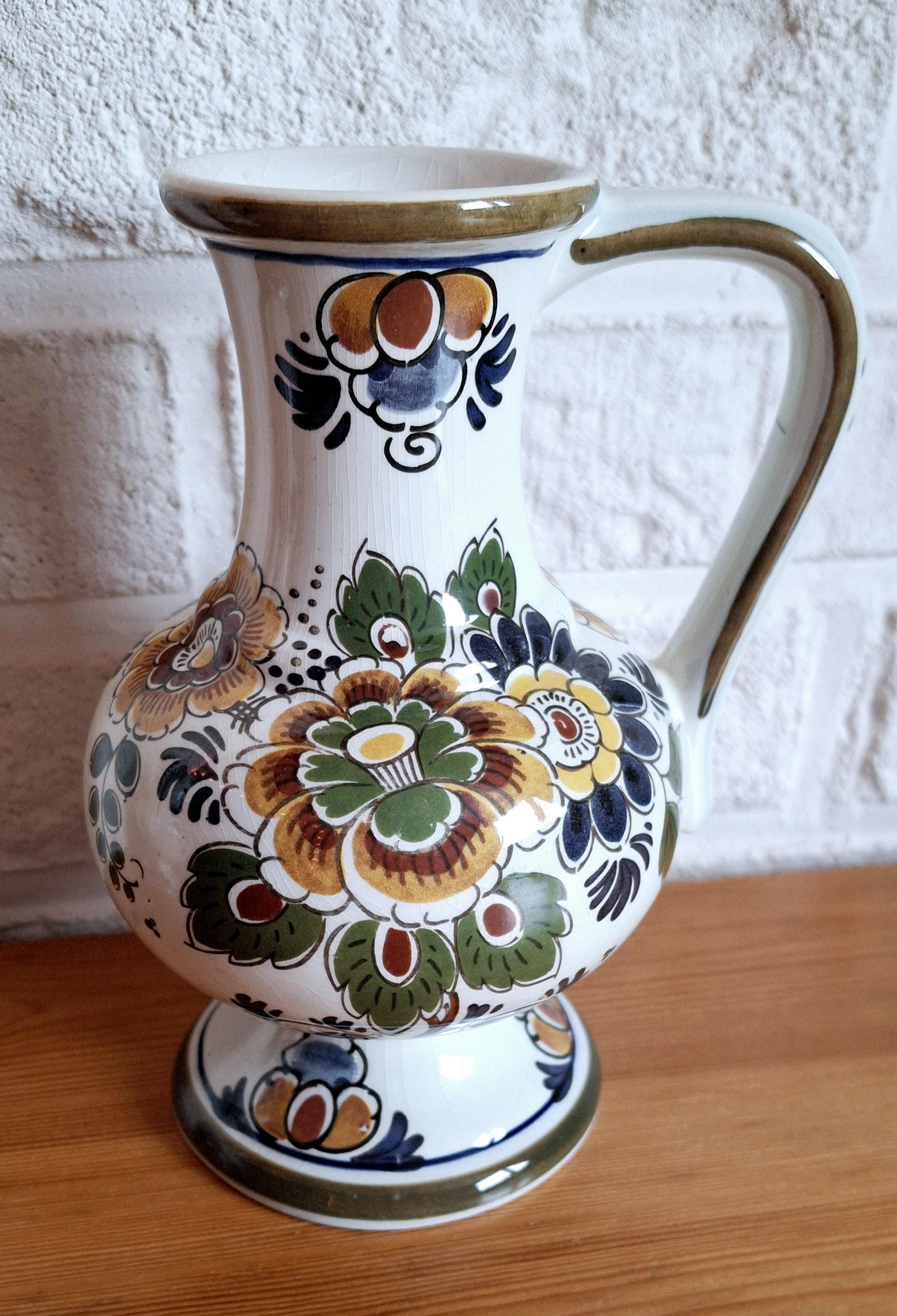 Pair of Delft Polychrome jugs, set of two Delft pitchers