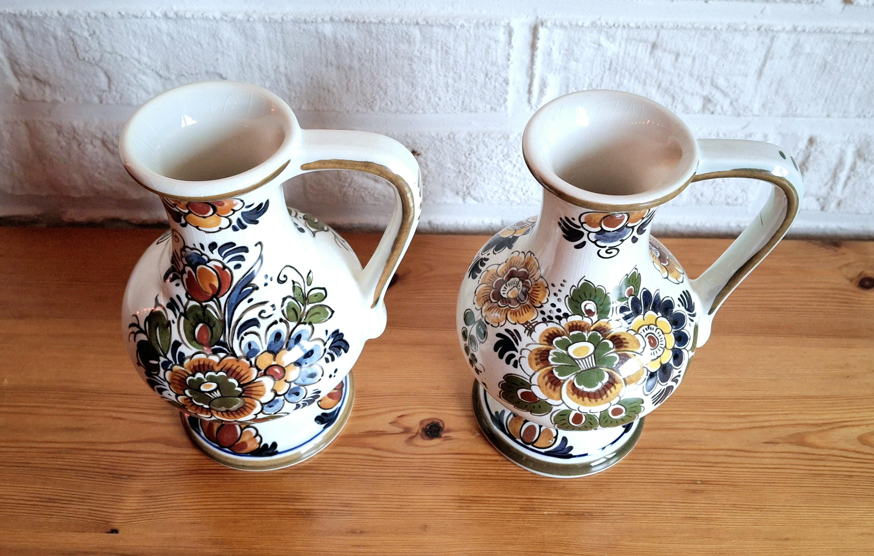 Pair of Delft Polychrome jugs, set of two Delft pitchers