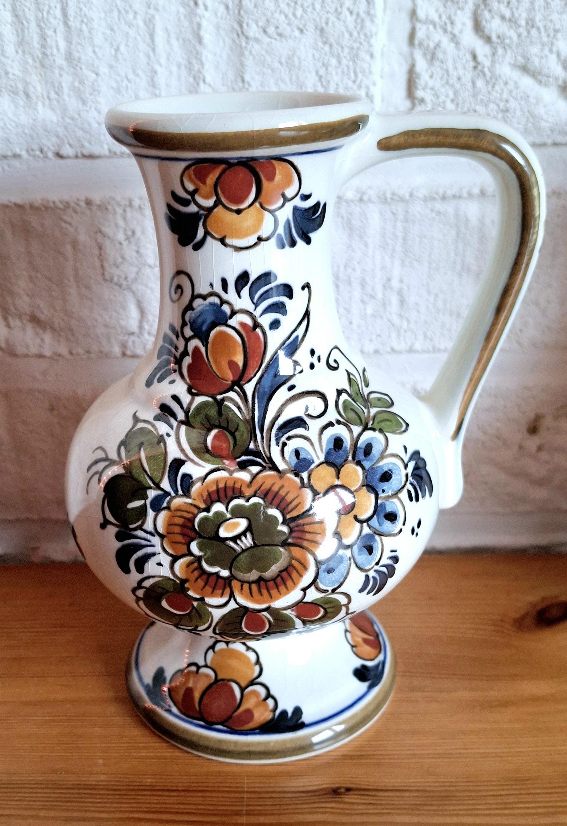 Pair of Delft Polychrome jugs, set of two Delft pitchers