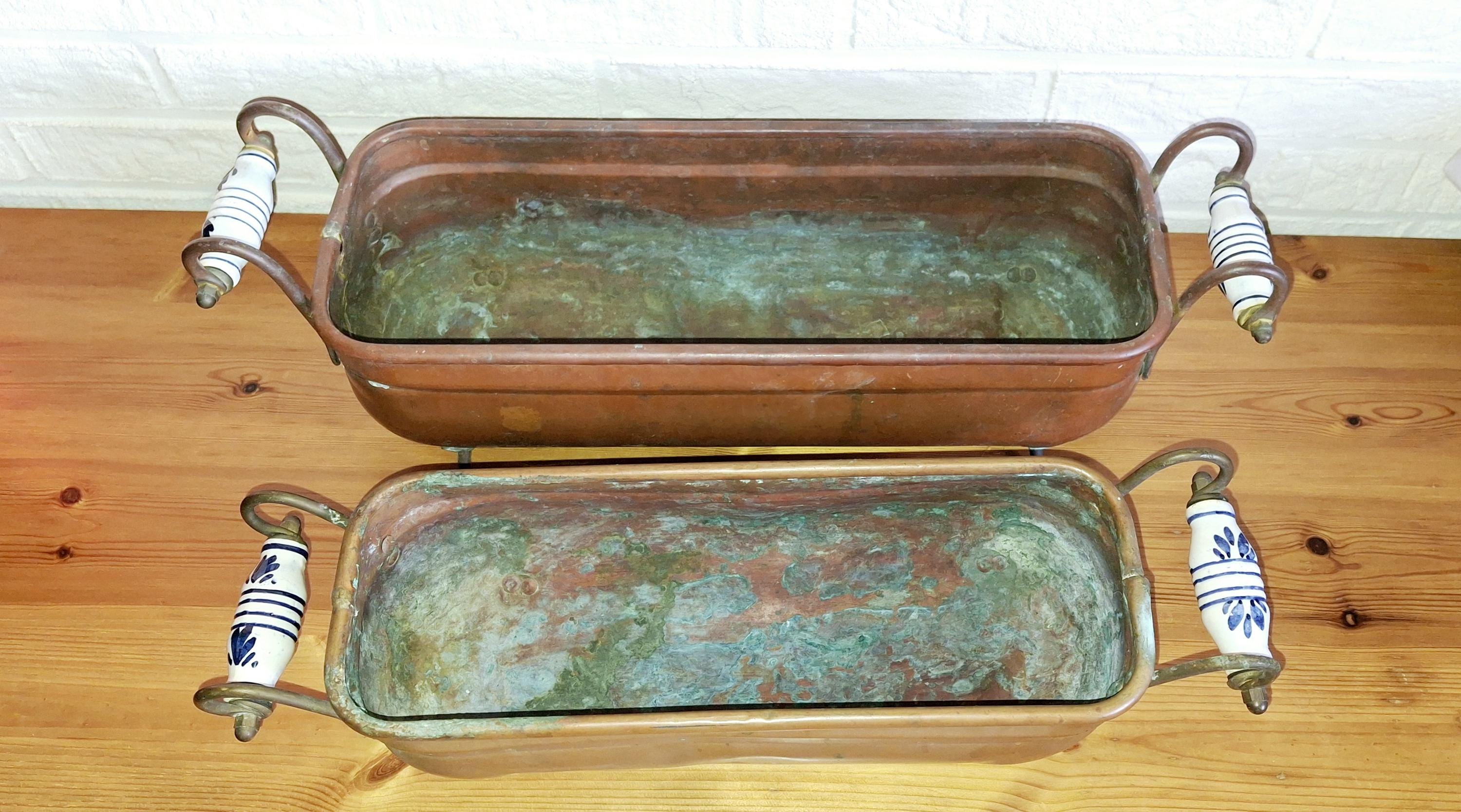 Two antique dutch copper planters, Hand wash bowl with Delft Porcelain Handles
