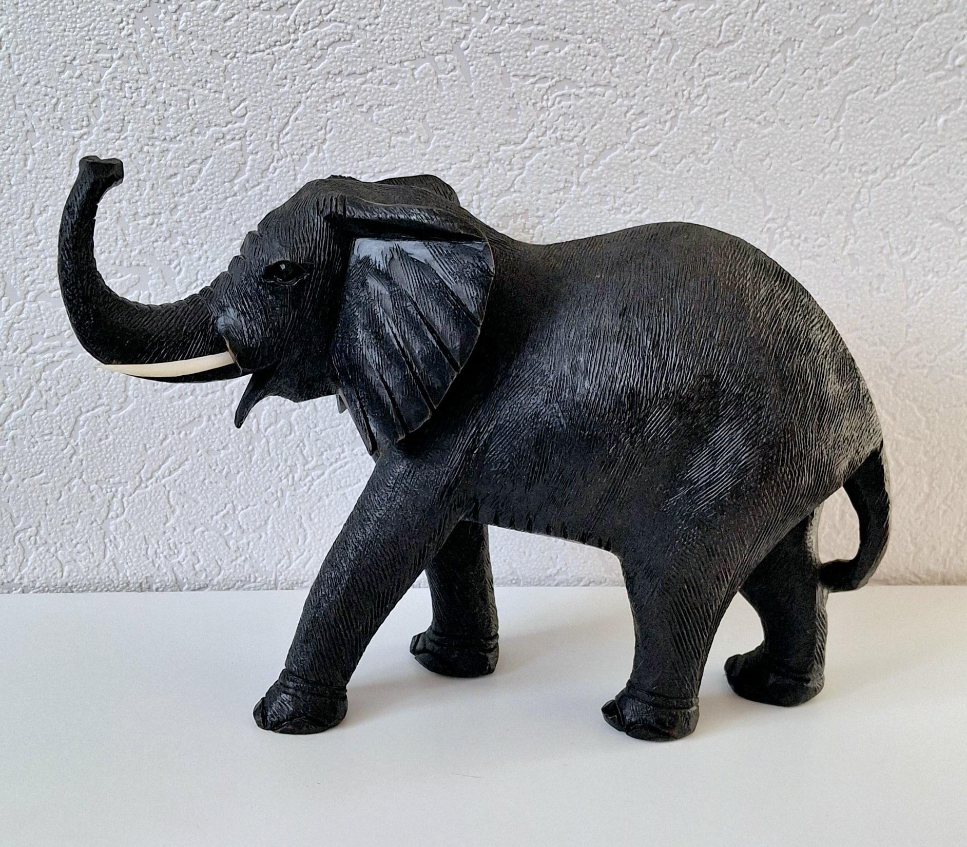 Hand-carved wooden elephant figurine