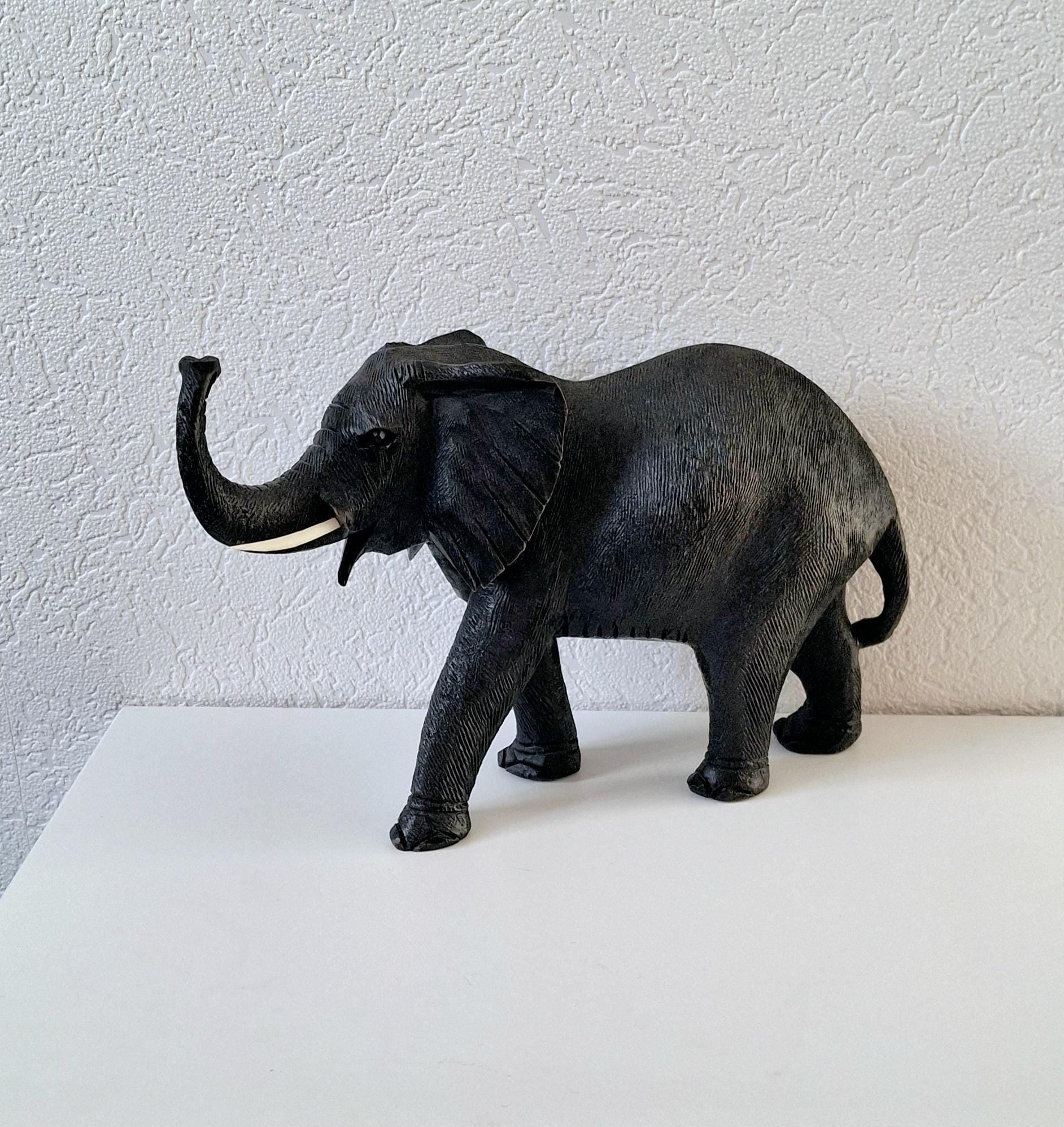 Hand-carved wooden elephant figurine