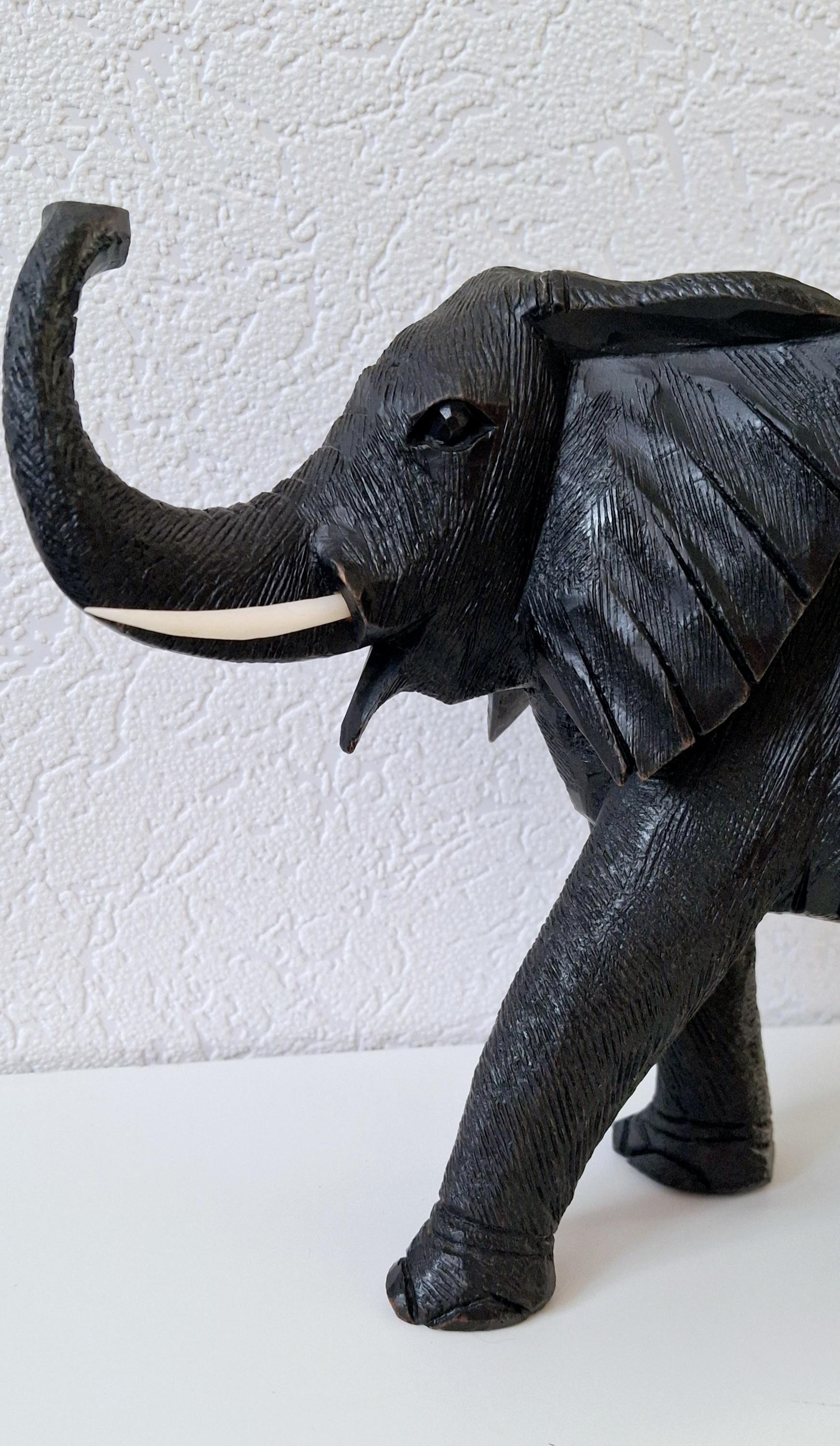 Hand-carved wooden elephant figurine