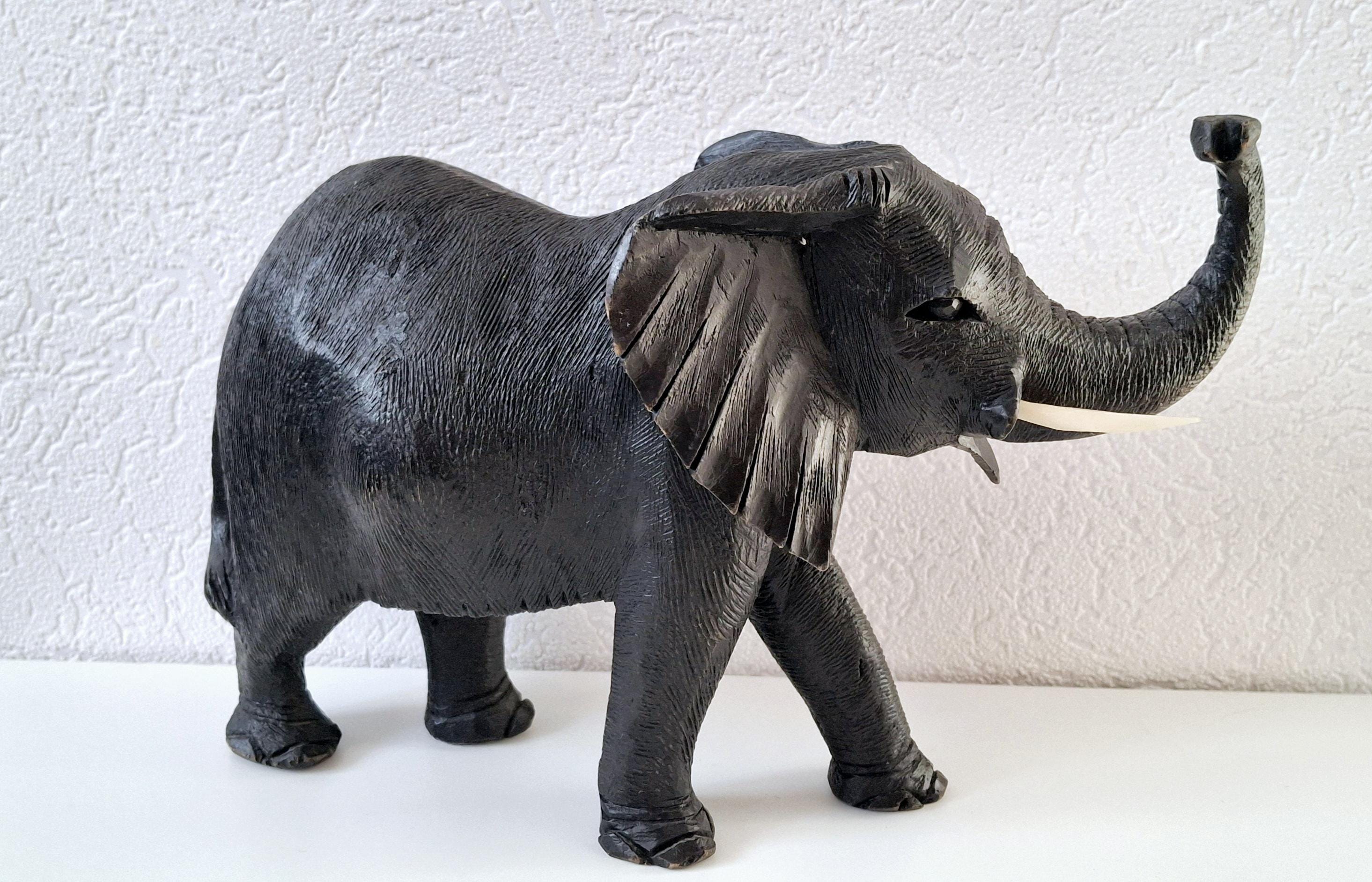 Hand-carved wooden elephant figurine