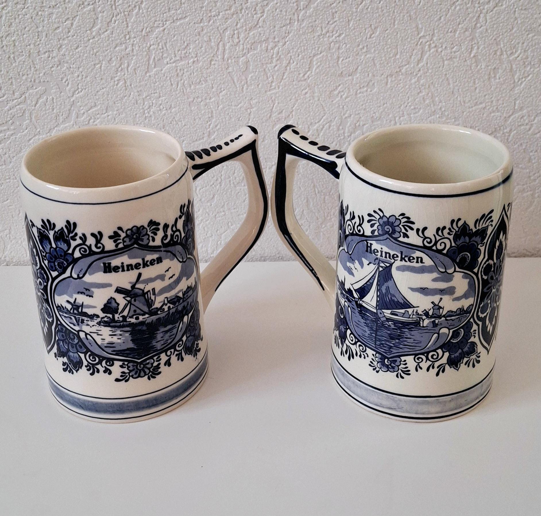 Pair of vintage Heineken Delft Blue beer mugs, Dutch beer steins
