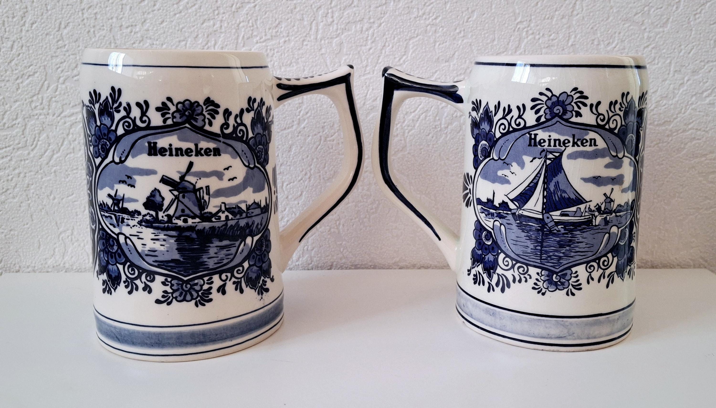 Pair of vintage Heineken Delft Blue beer mugs, Dutch beer steins