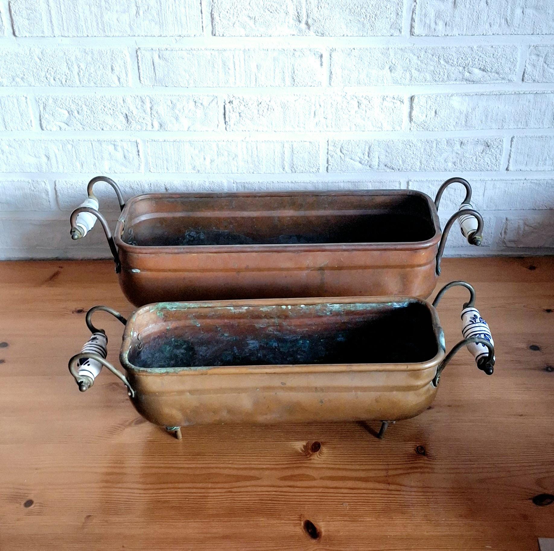 Two antique dutch copper planters, Hand wash bowl with Delft Porcelain Handles