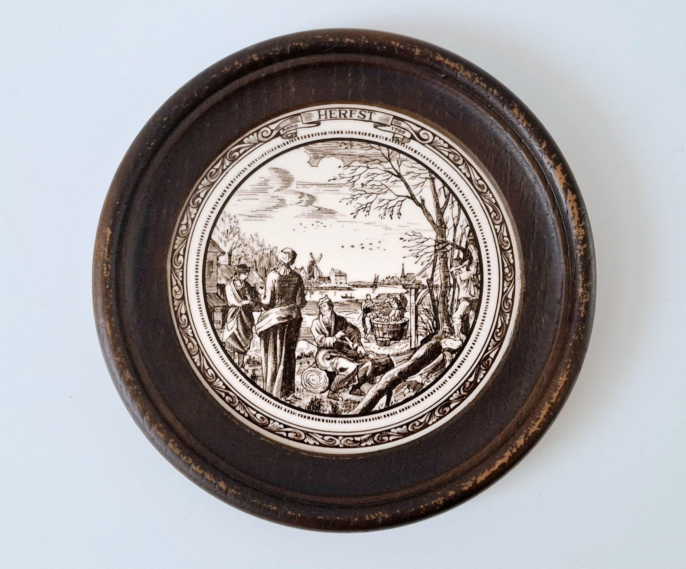 Set of 4 seasonal ceramic tiles in round wooden frames