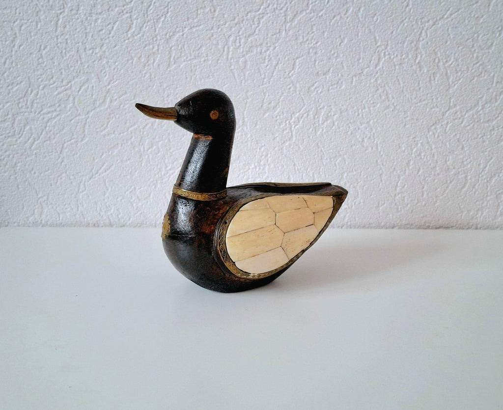 Nepalese lucky duck figurine