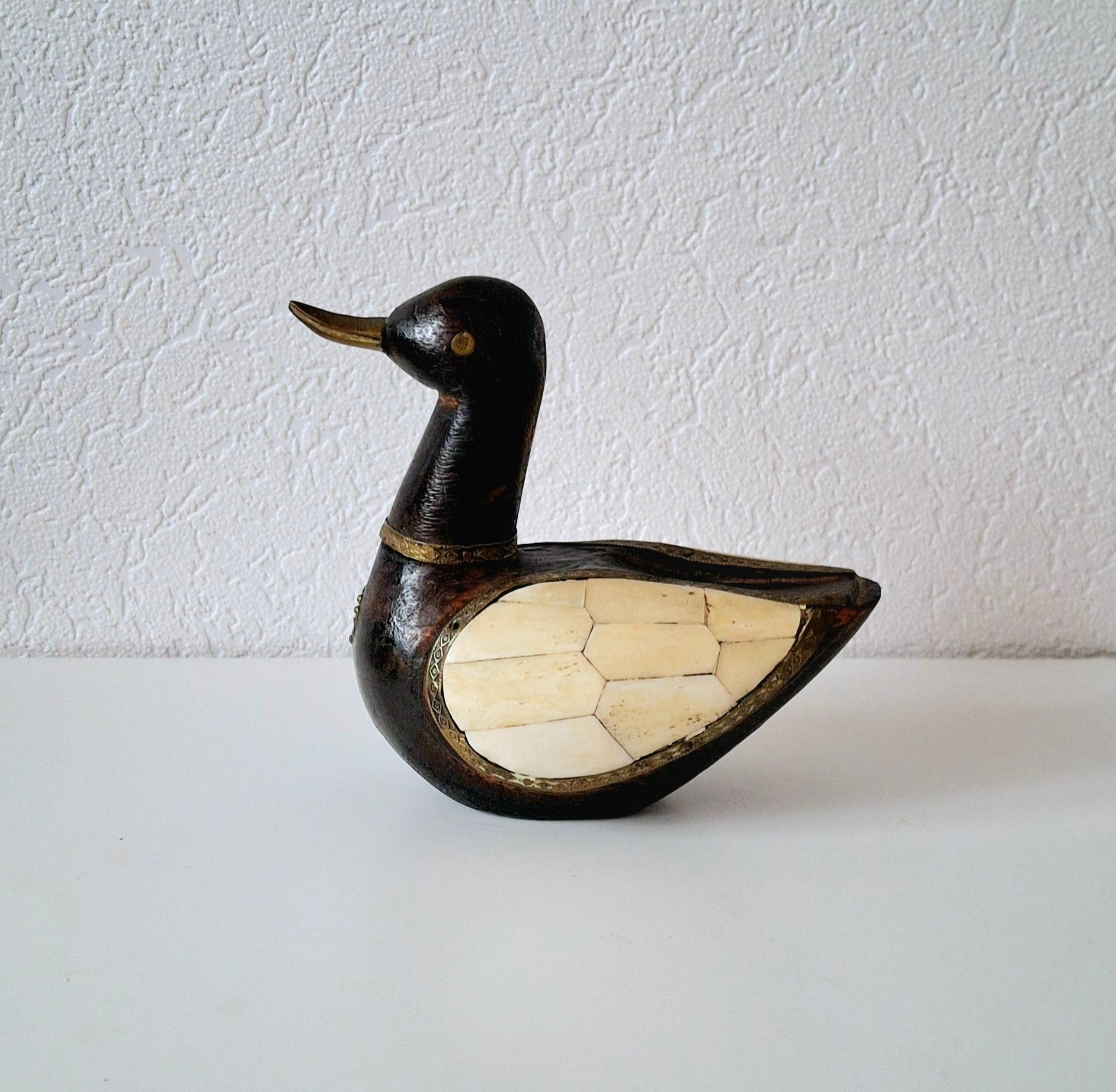 Nepalese lucky duck figurine