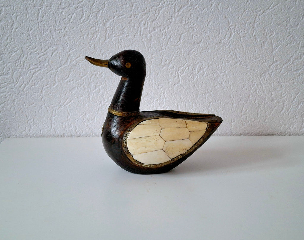 Nepalese lucky duck figurine