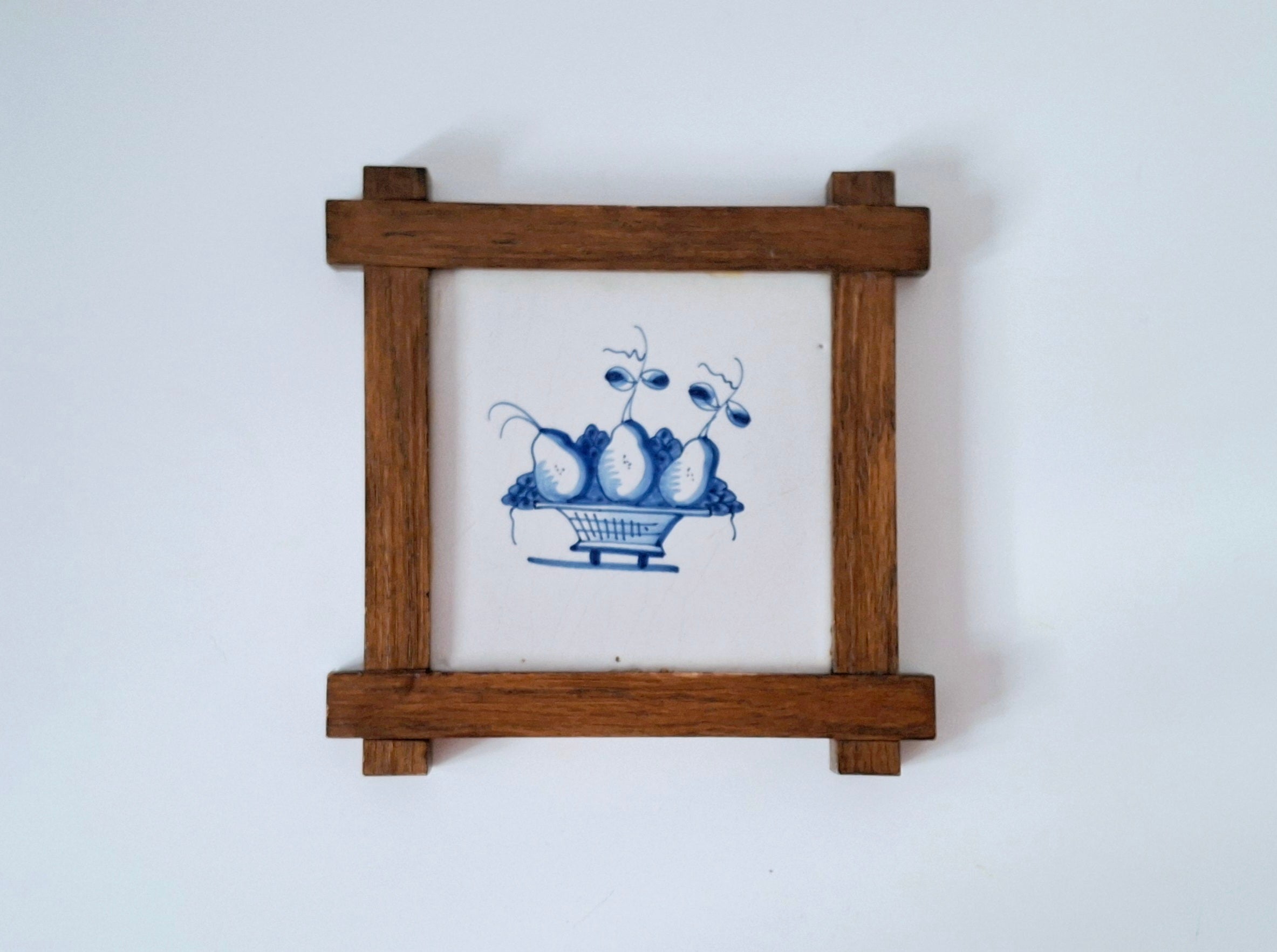Dutch blue & white decorative tile in oak frame, antique Delft basket of fruit tile