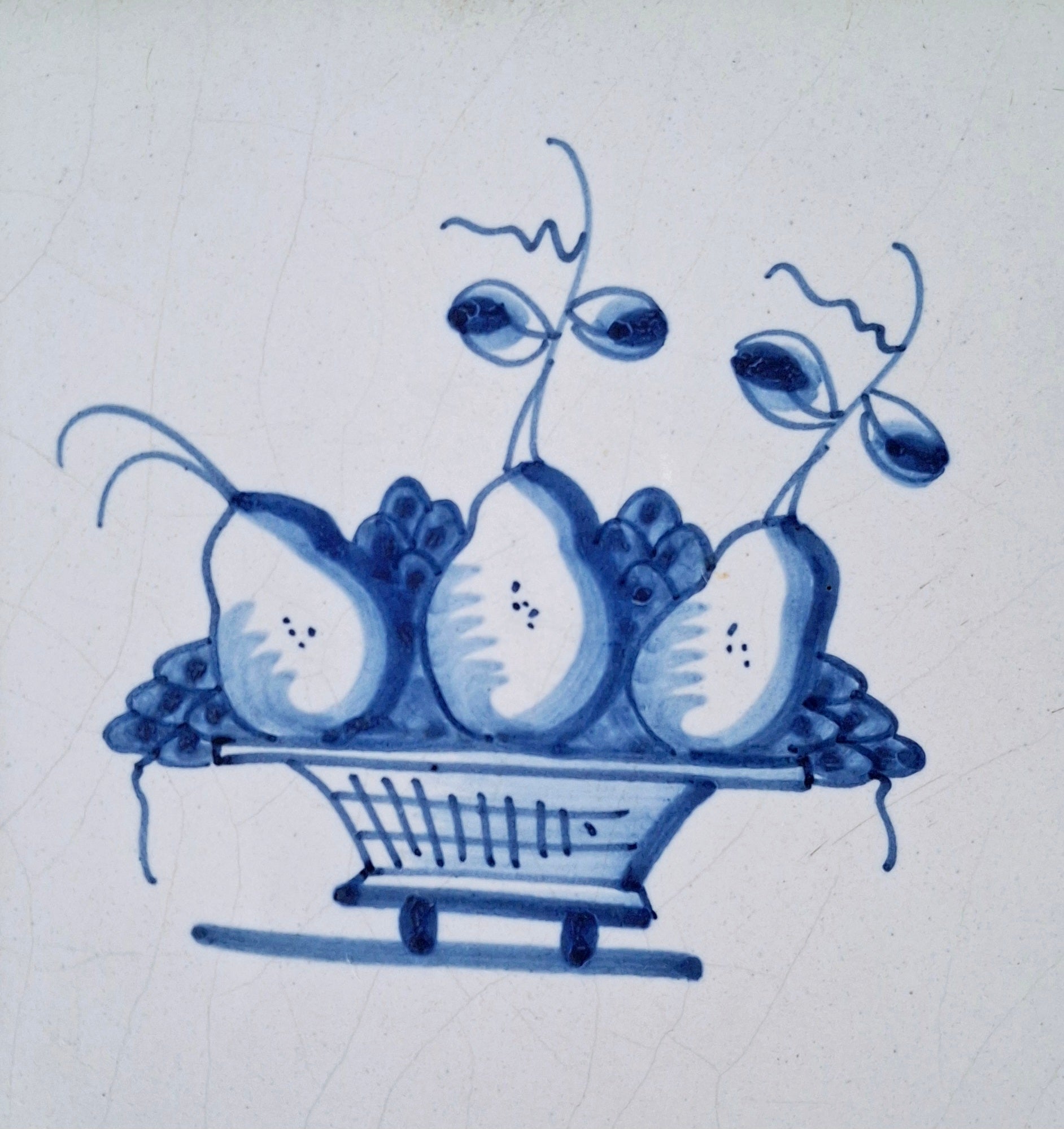 Dutch blue & white decorative tile in oak frame, antique Delft basket of fruit tile