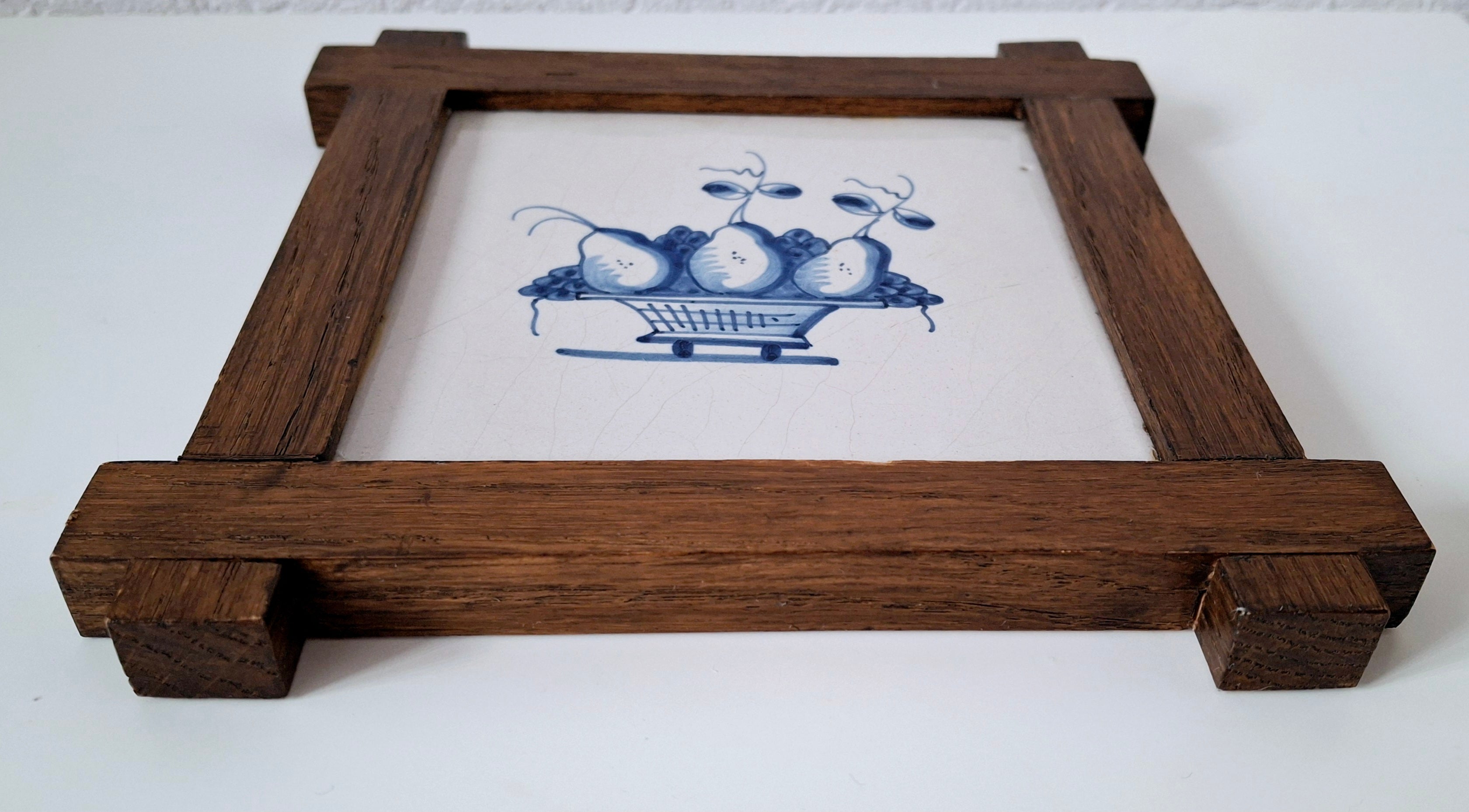 Dutch blue & white decorative tile in oak frame, antique Delft basket of fruit tile