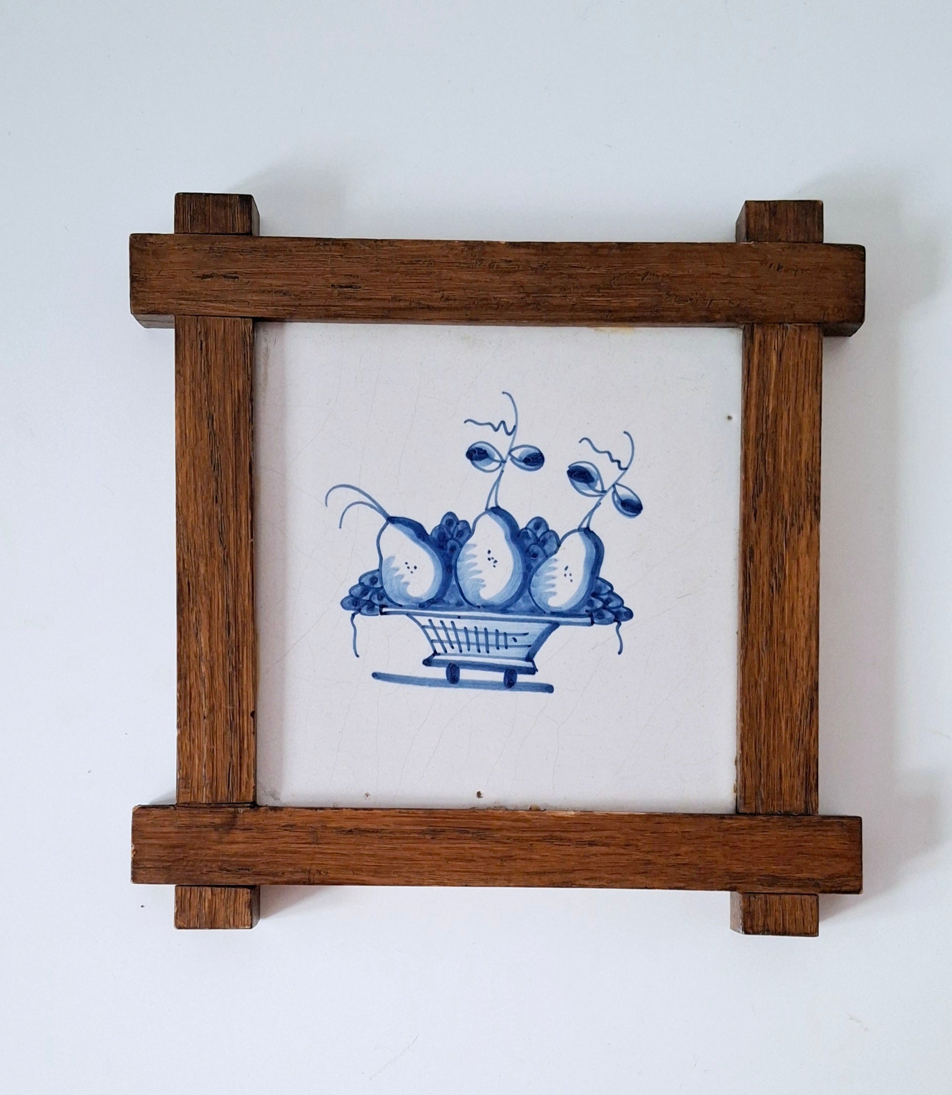 Dutch blue & white decorative tile in oak frame, antique Delft basket of fruit tile