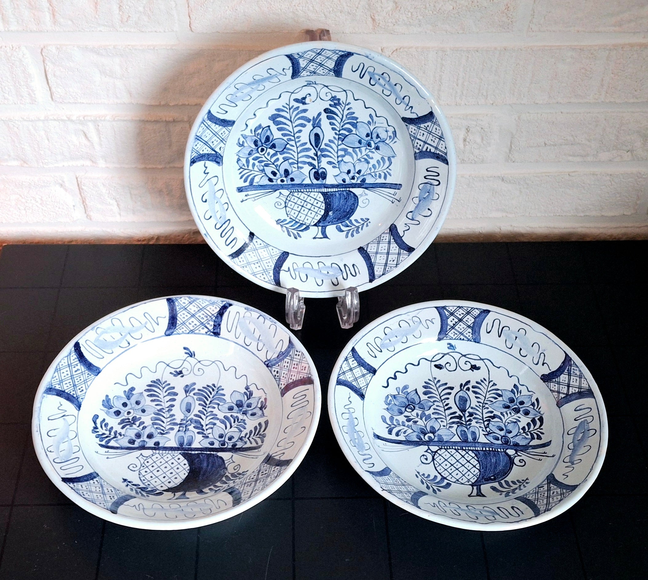 Set of three 19th century Delft-style decorative dutch plates