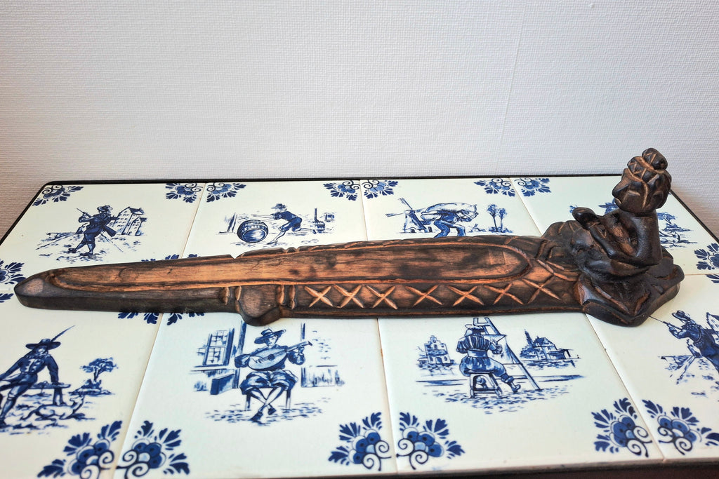 Wooden meditative figure incense holder