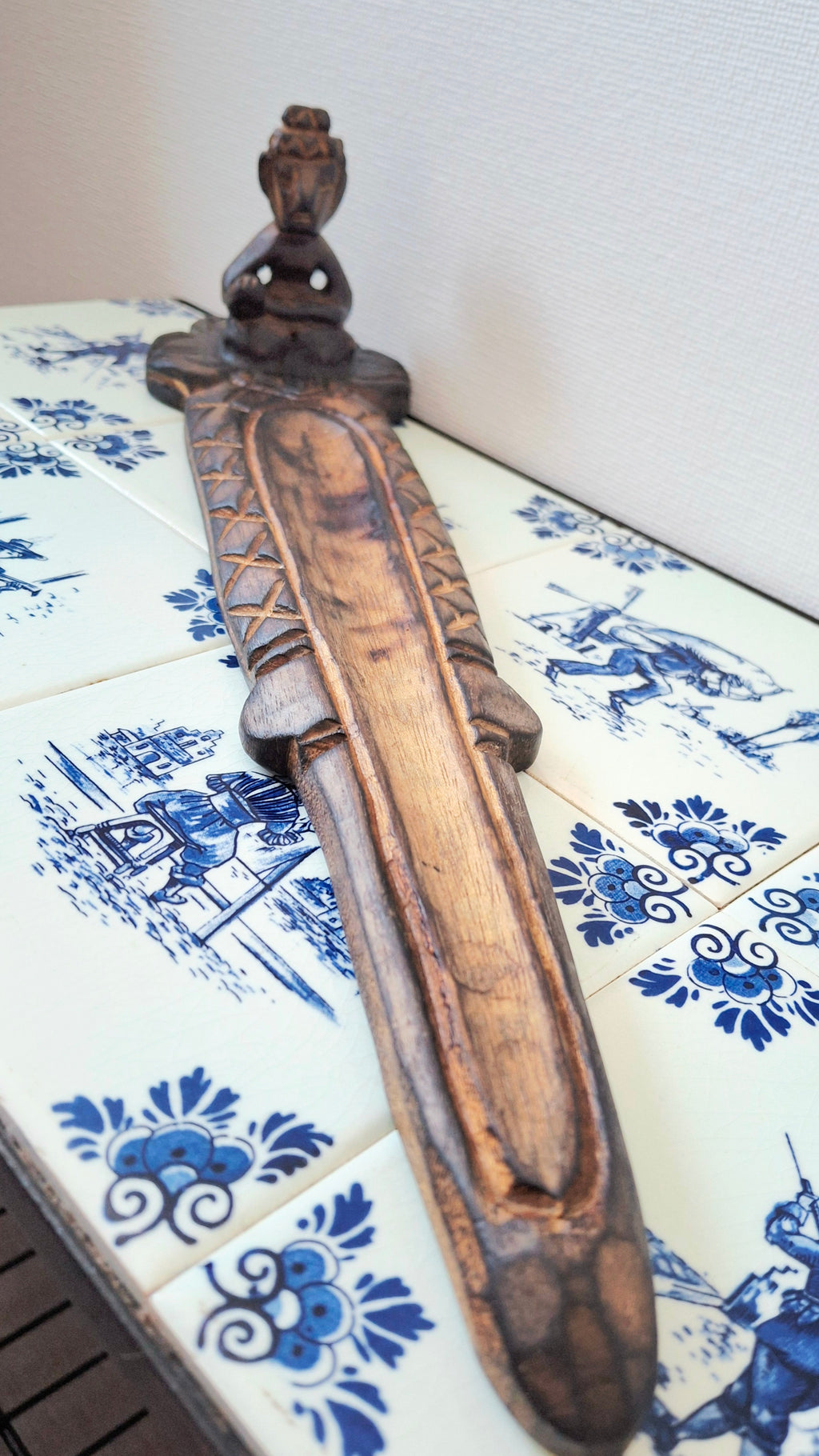 Wooden meditative figure incense holder