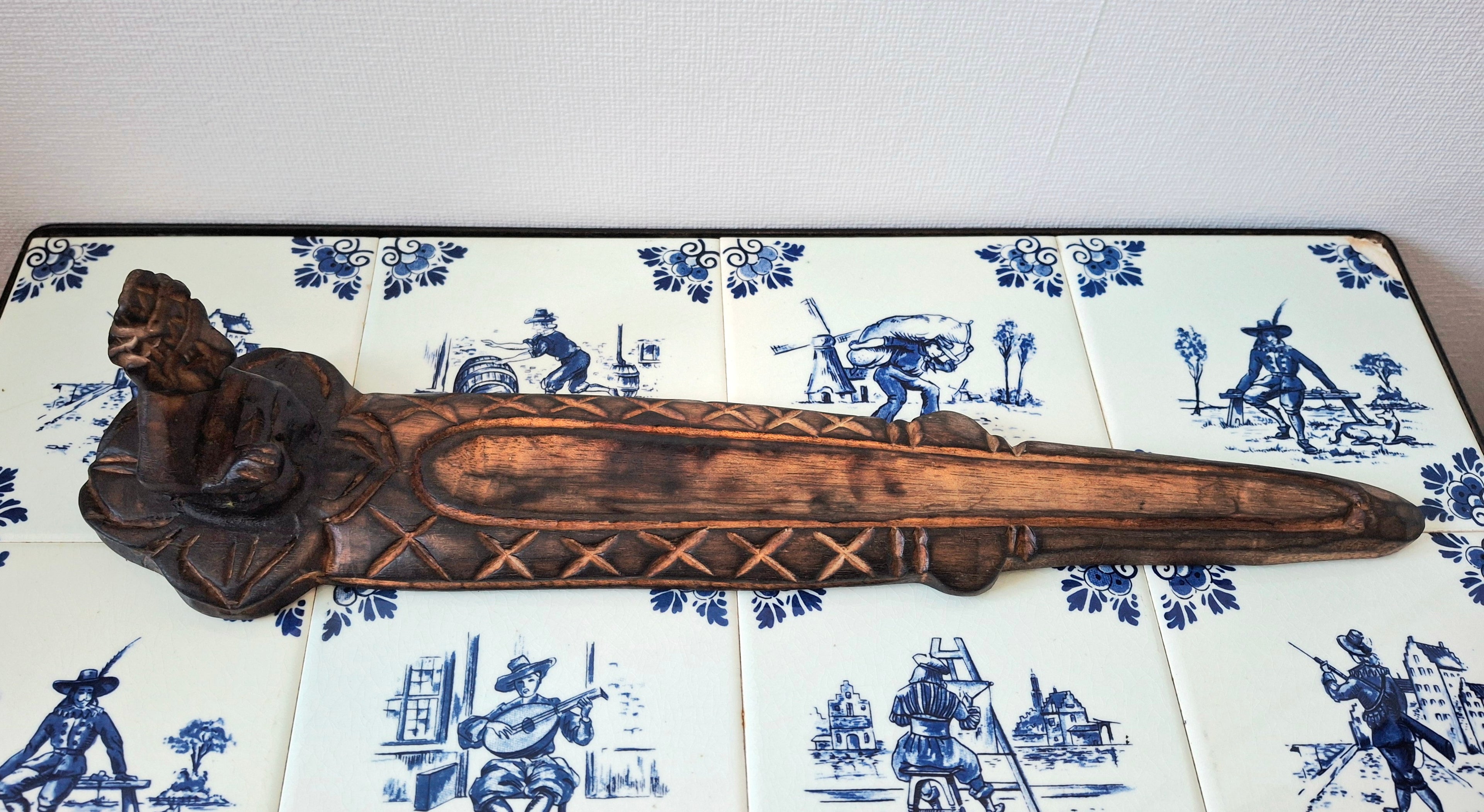 Wooden meditative figure incense holder