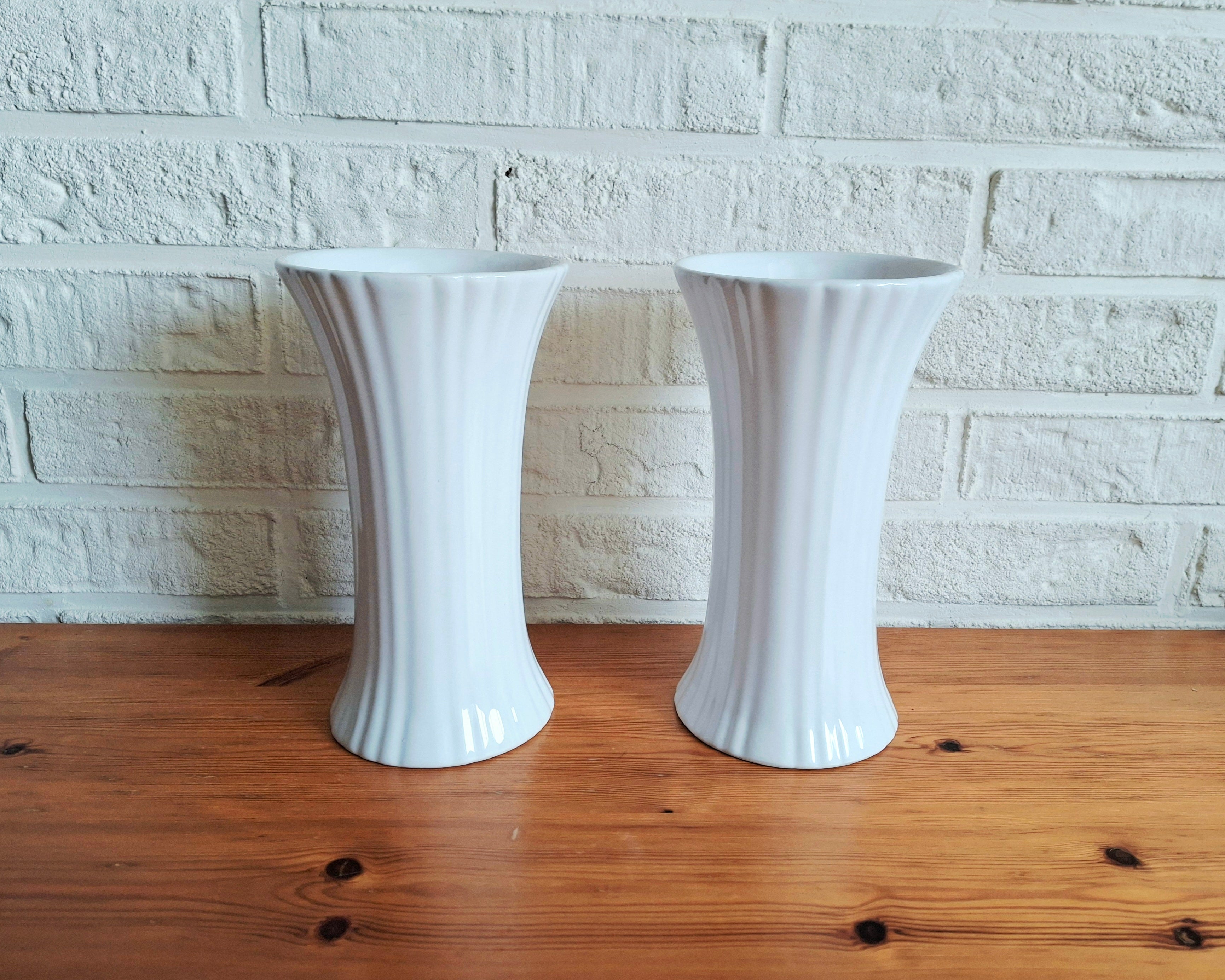 Pair of vintage “Porcelia Delfts Wit” white porcelain vases