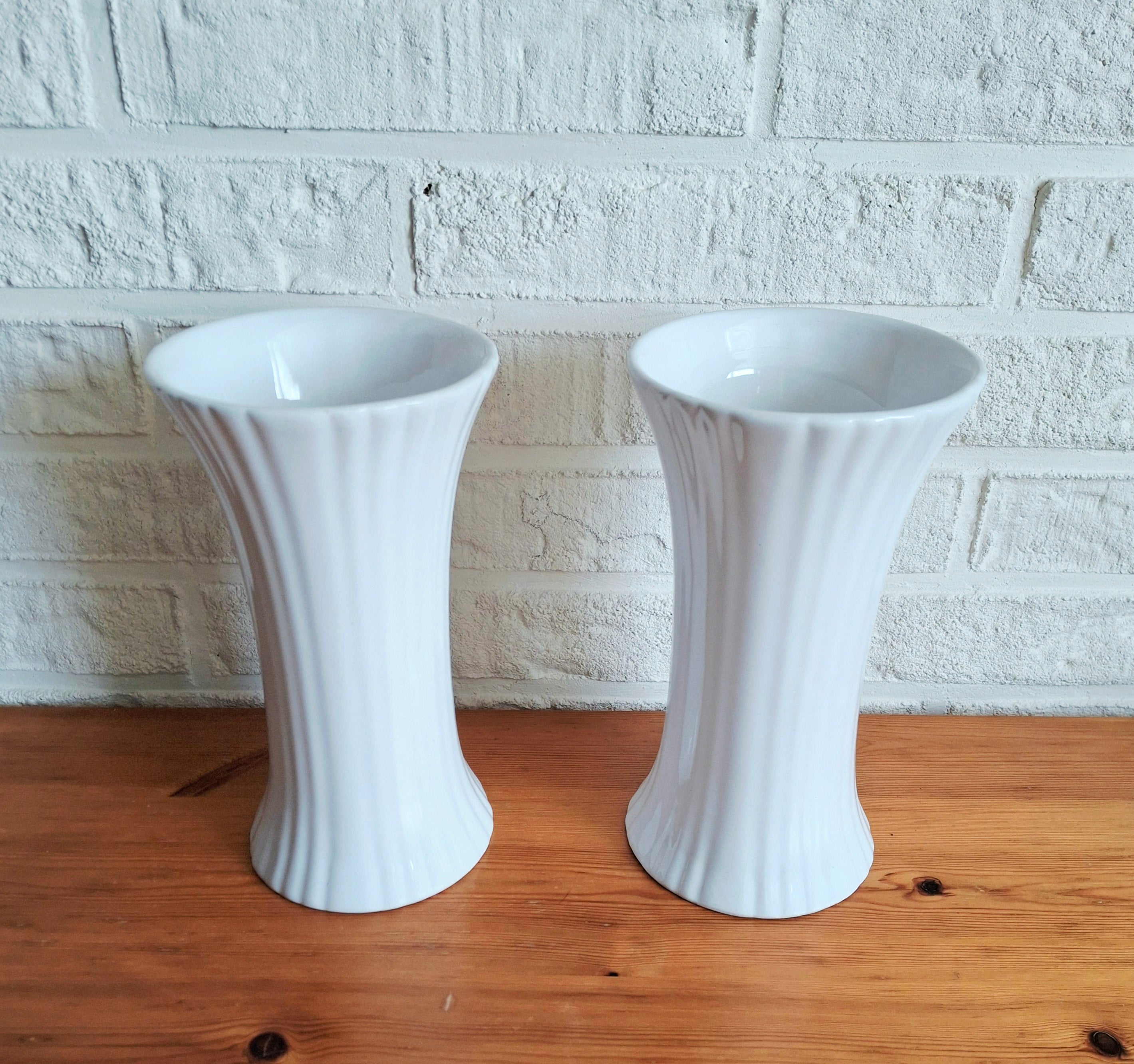 Pair of vintage “Porcelia Delfts Wit” white porcelain vases