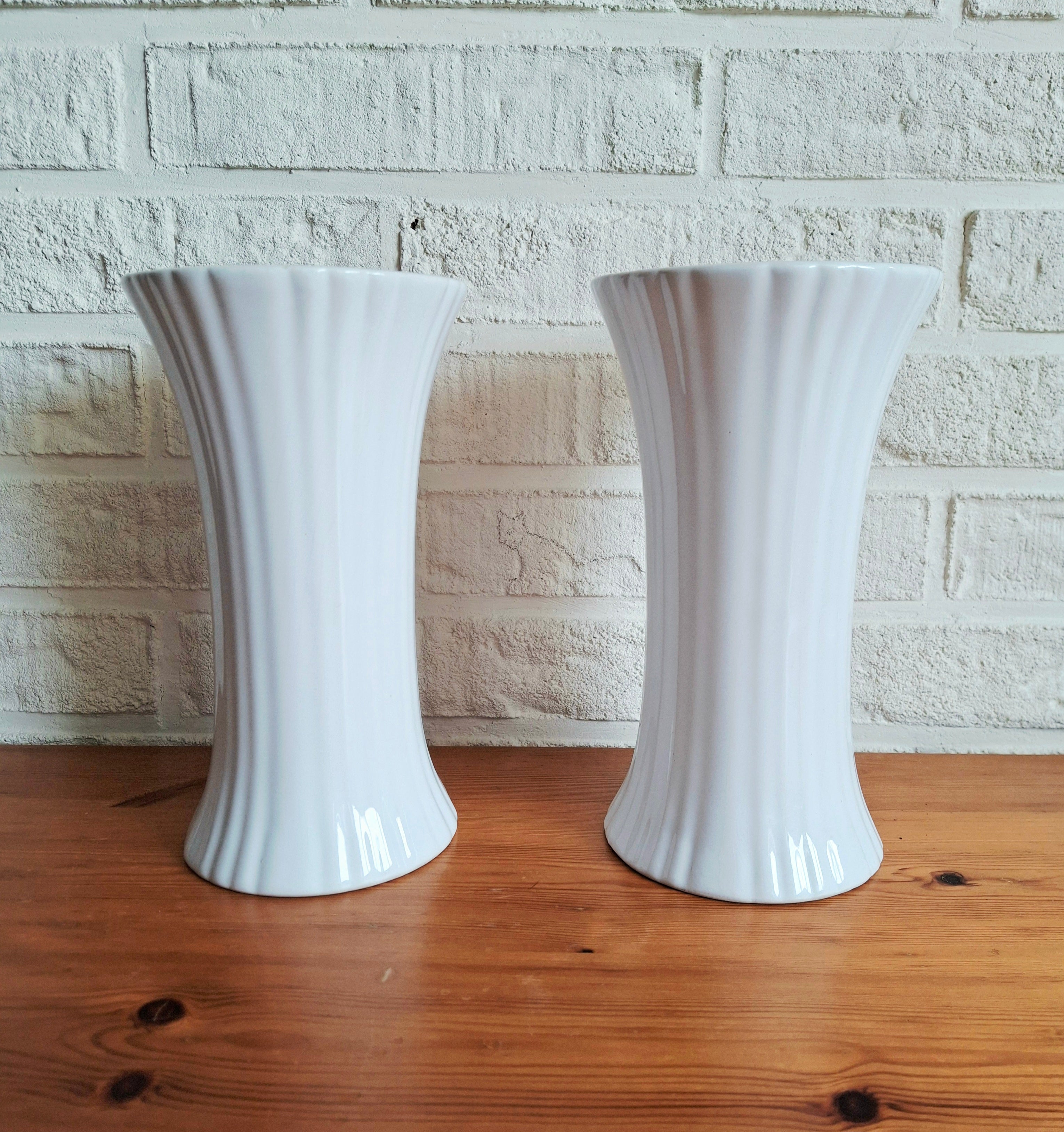 Pair of vintage “Porcelia Delfts Wit” white porcelain vases