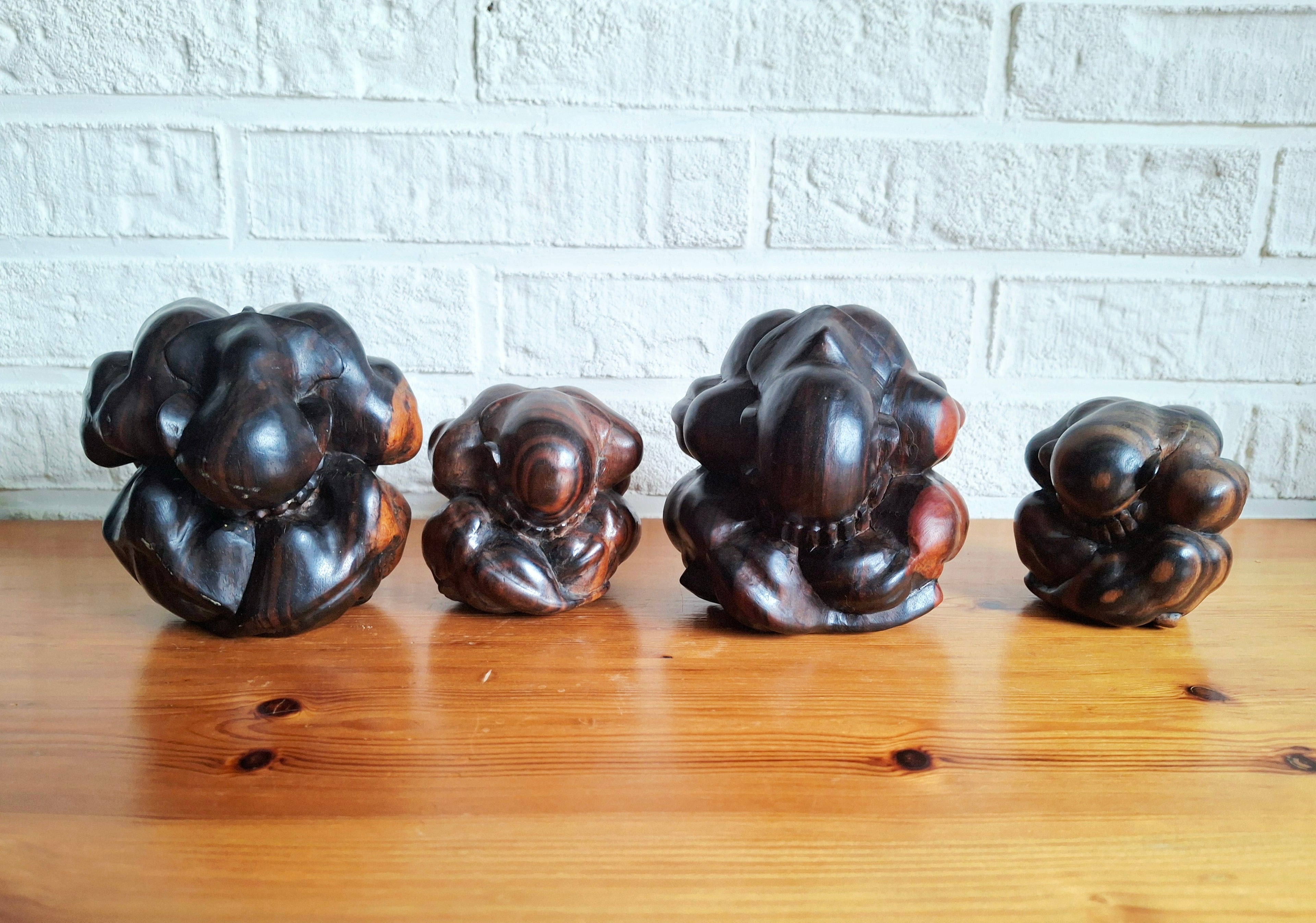 Set of four ironwood Buddha figurines, Hand carved Yogi or Weeping Men Figure, Protective pocket totems