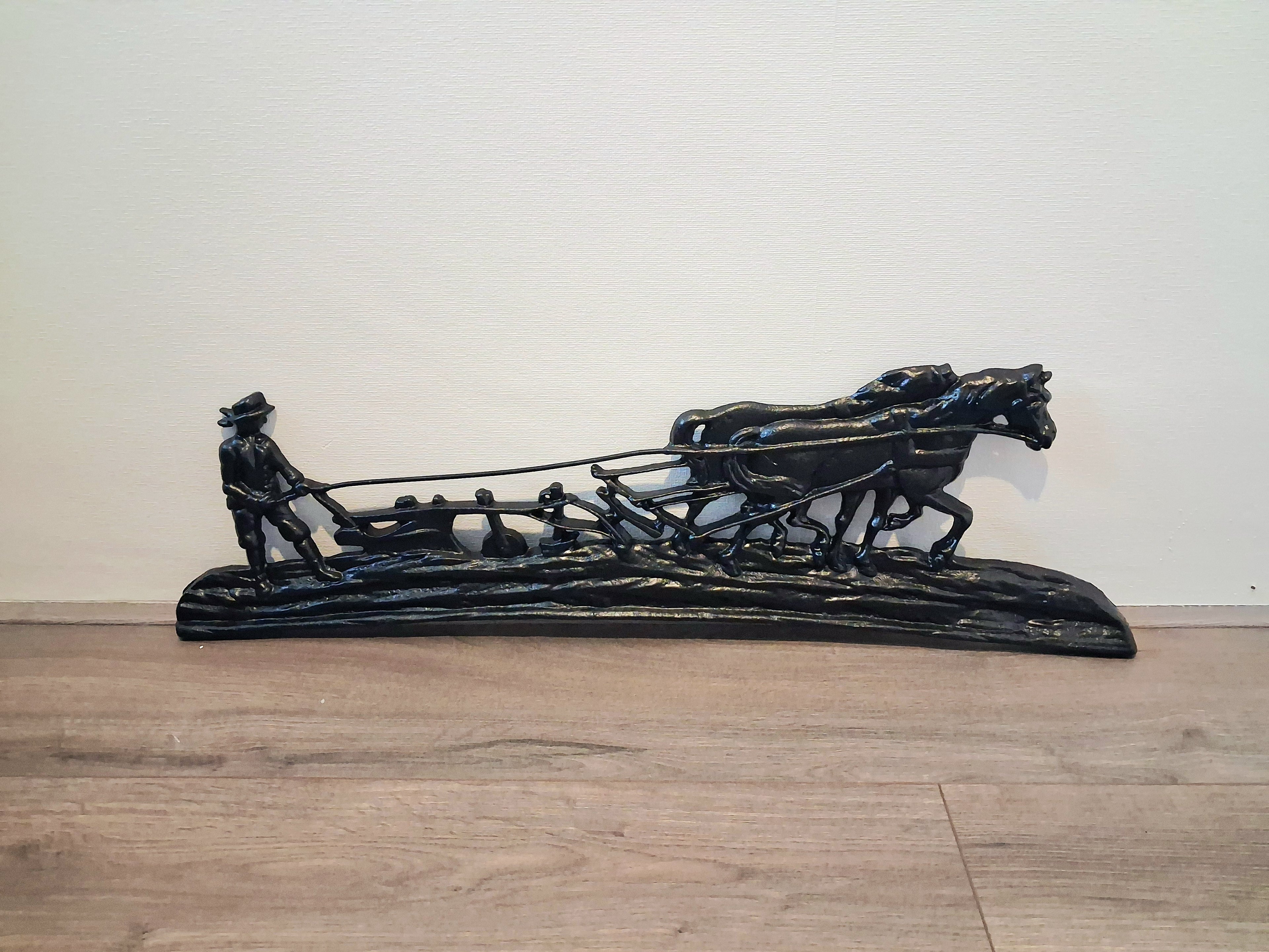 Cast iron wall or fireplace art panel, Horse-drawn plough scene