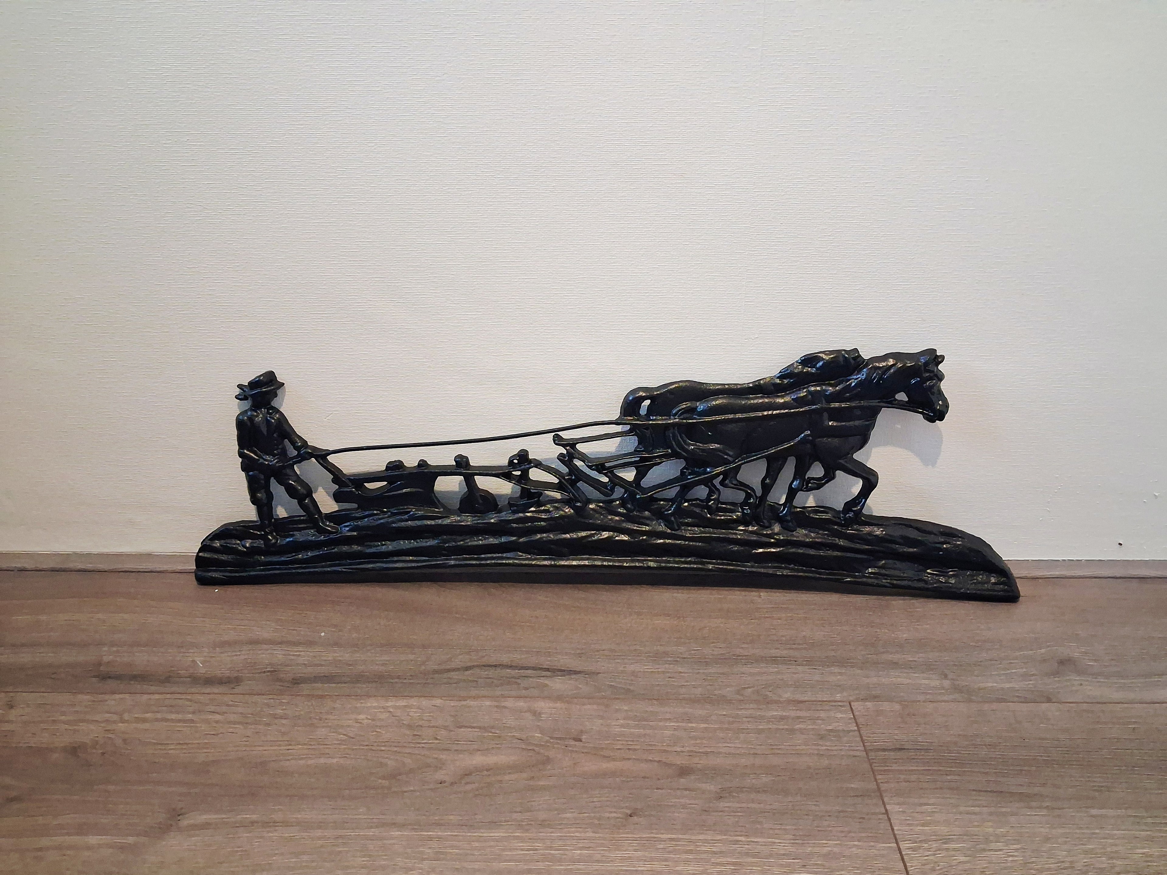 Cast iron wall or fireplace art panel, Horse-drawn plough scene