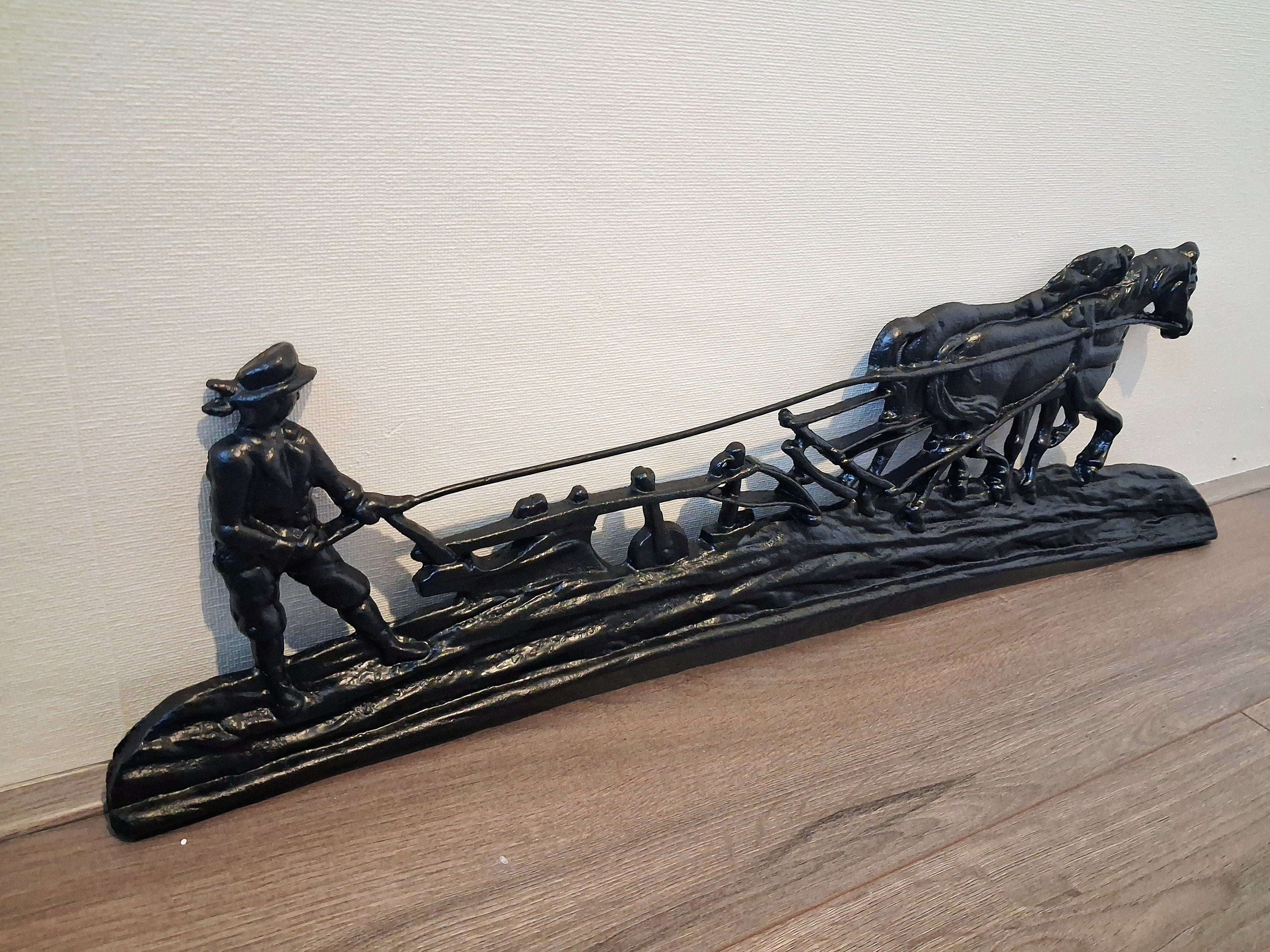 Cast iron wall or fireplace art panel, Horse-drawn plough scene