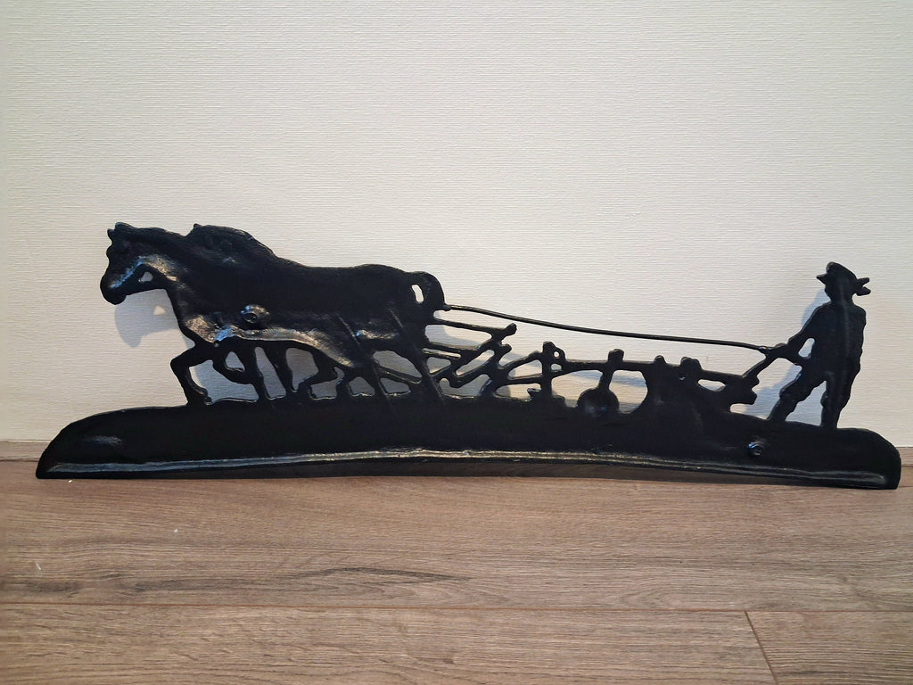 Cast iron wall or fireplace art panel, Horse-drawn plough scene