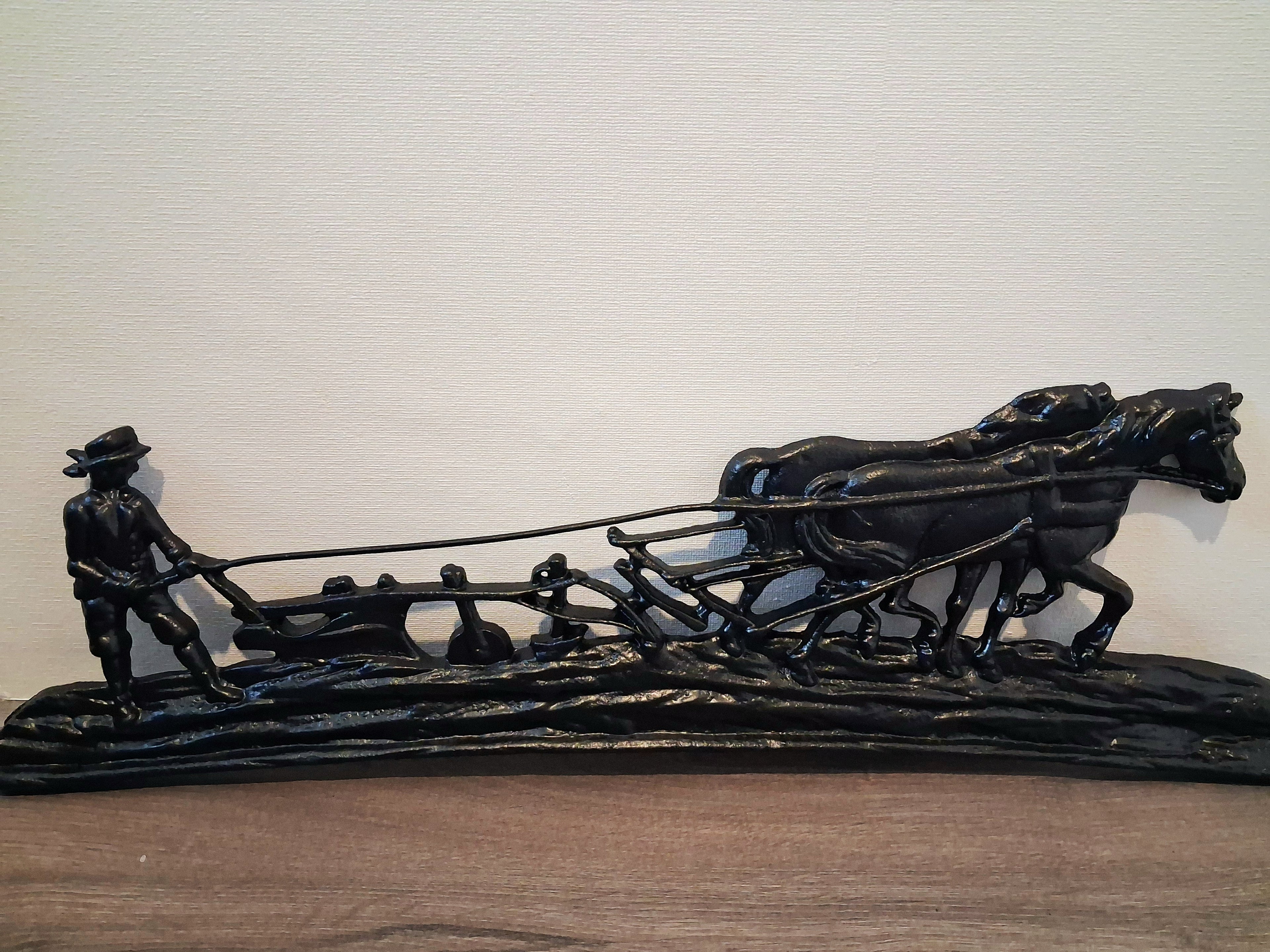 Cast iron wall or fireplace art panel, Horse-drawn plough scene