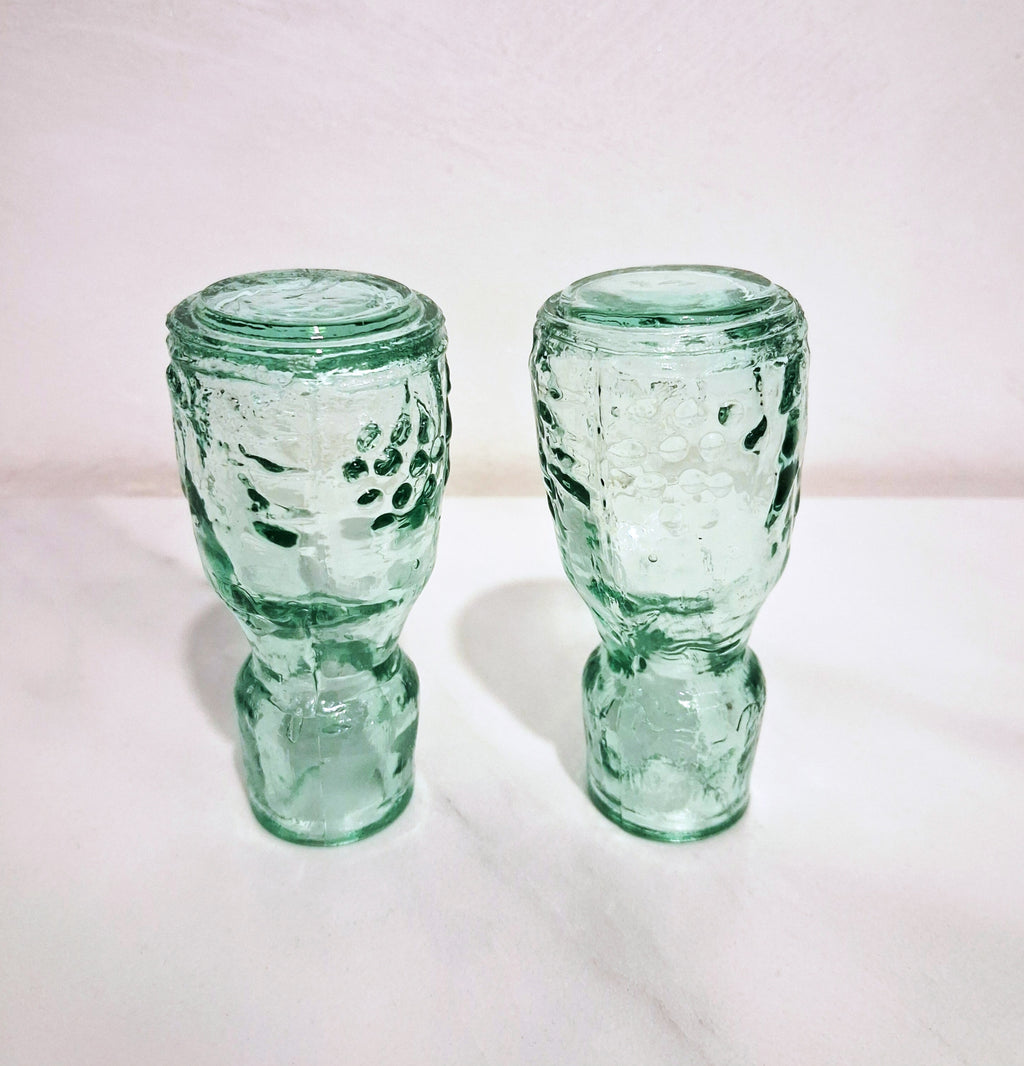 Pair of green glass Decanters with stoppers, Embossed grape motif