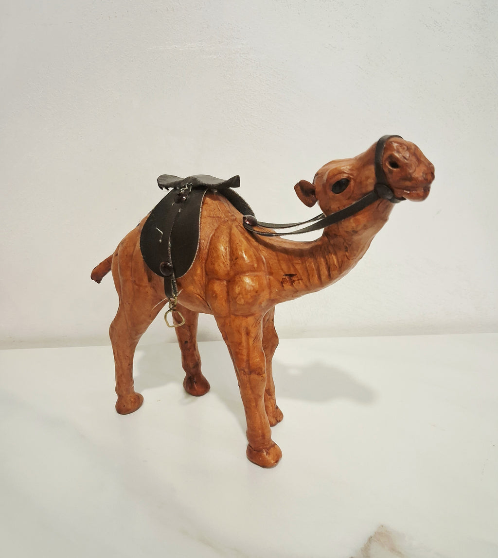 Leather-covered camel figurines set of three