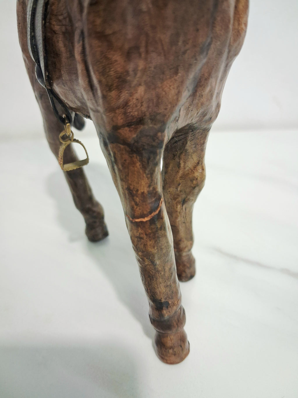 Leather-covered horse figurines set of three